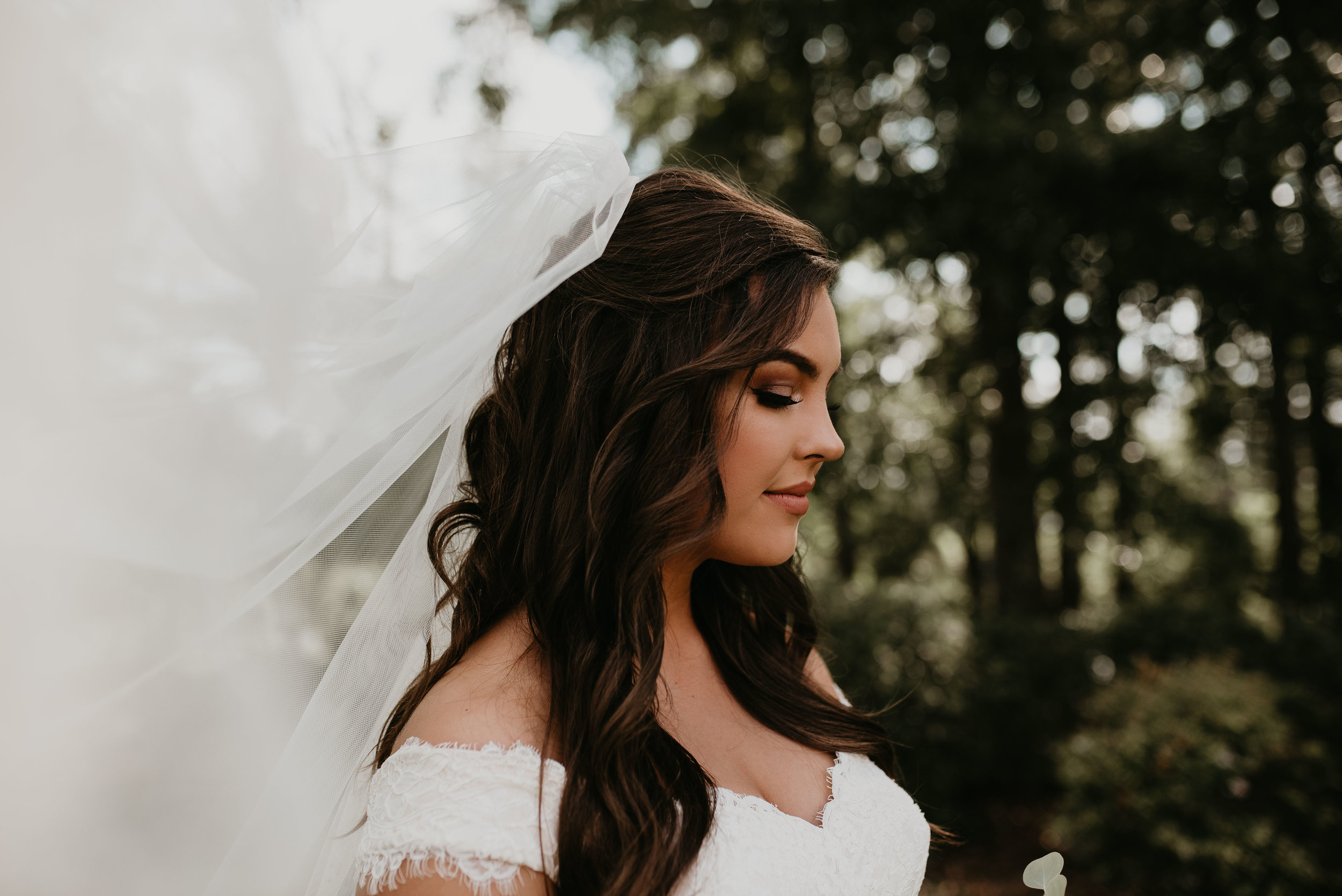 Bride’s wind blown veil at Wesleyan College in Macon, GA