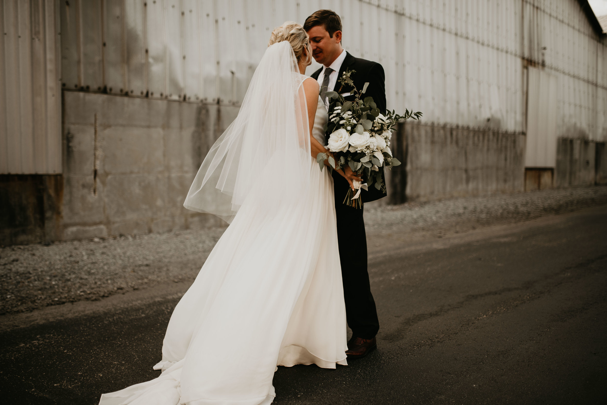 Bride and groom close together at The Foundry at Puritan Mill in Atlanta, GA
