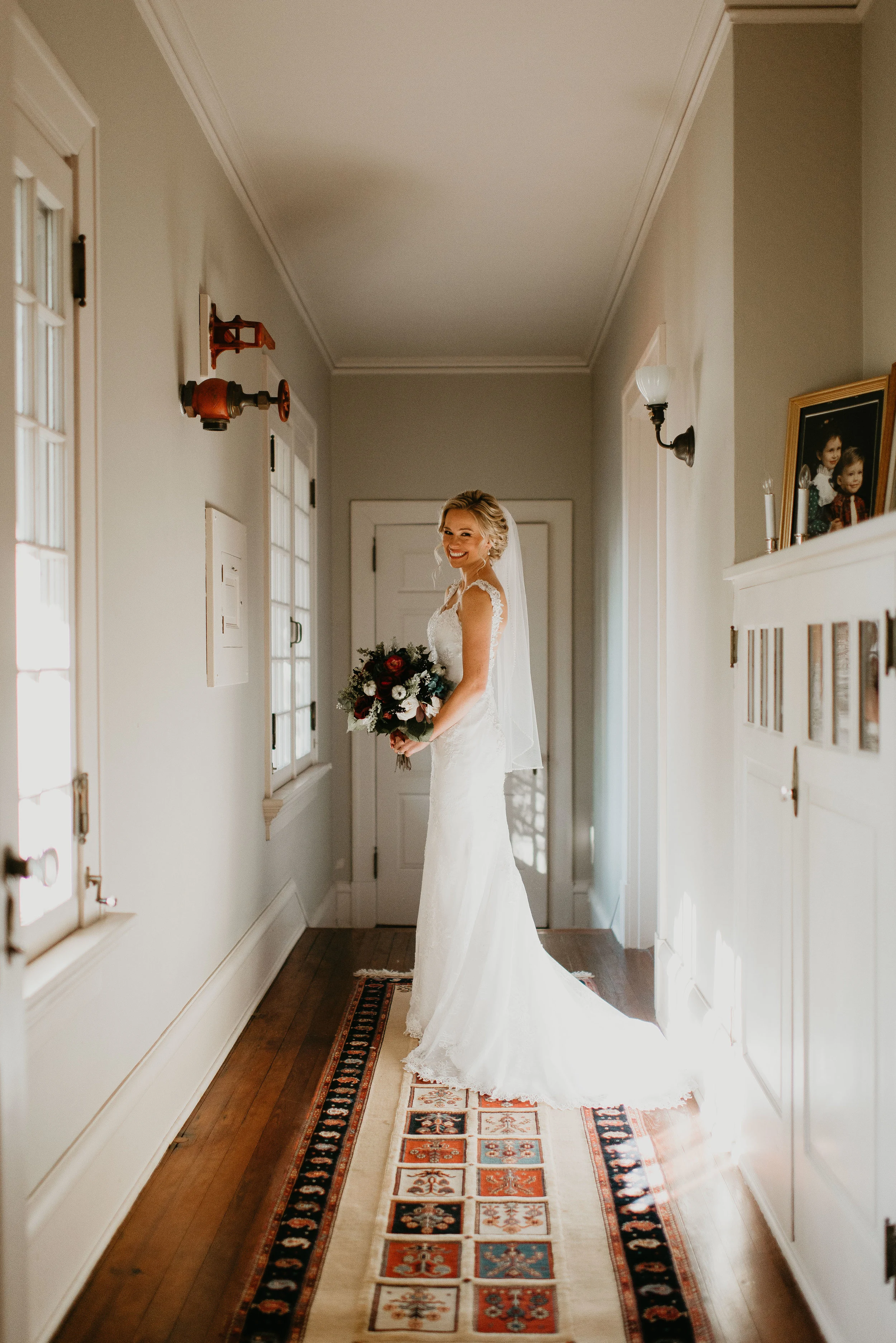 Portrait of bride holding bouquet inside Sydonie Mansion in Mt. Dora, FL