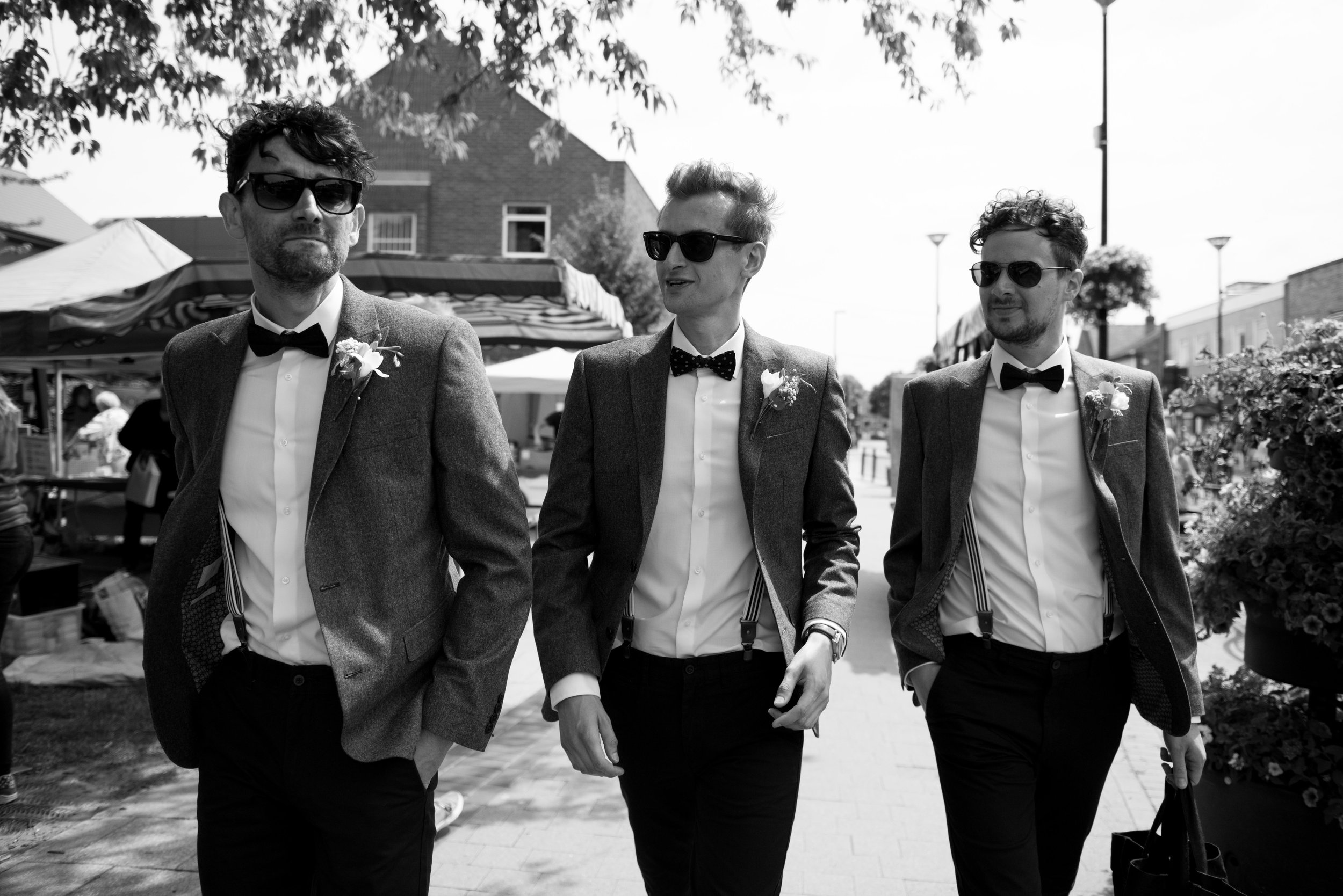 West Bridgford Registry Office, Nottingham. Groom &amp; Best Men Walking. looking very cool.  Coales Capture Wedding Photography