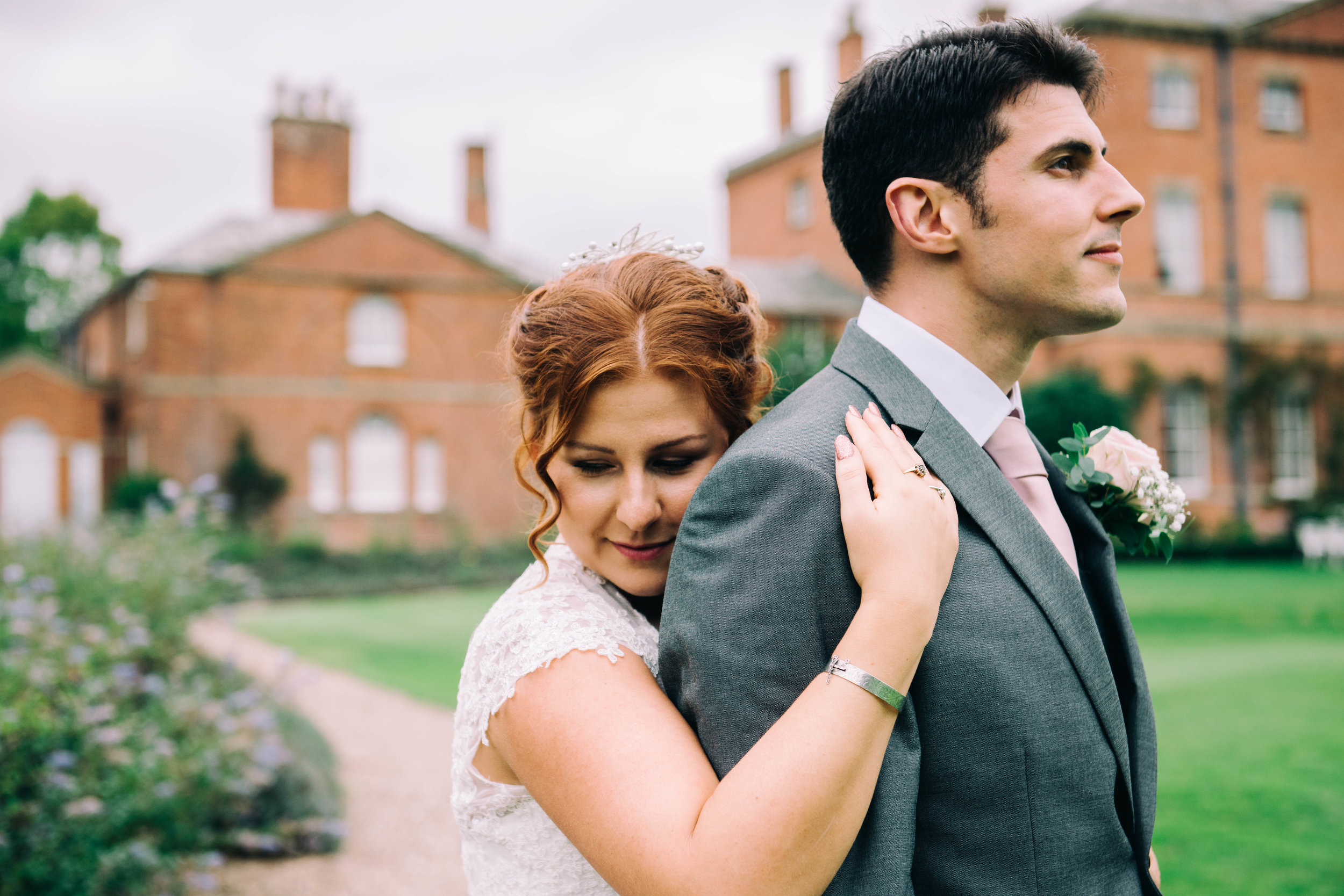 Norwood Park, Southwell. Jo &amp; Danny embracing in the gardens. Coales Capture Wedding Photography