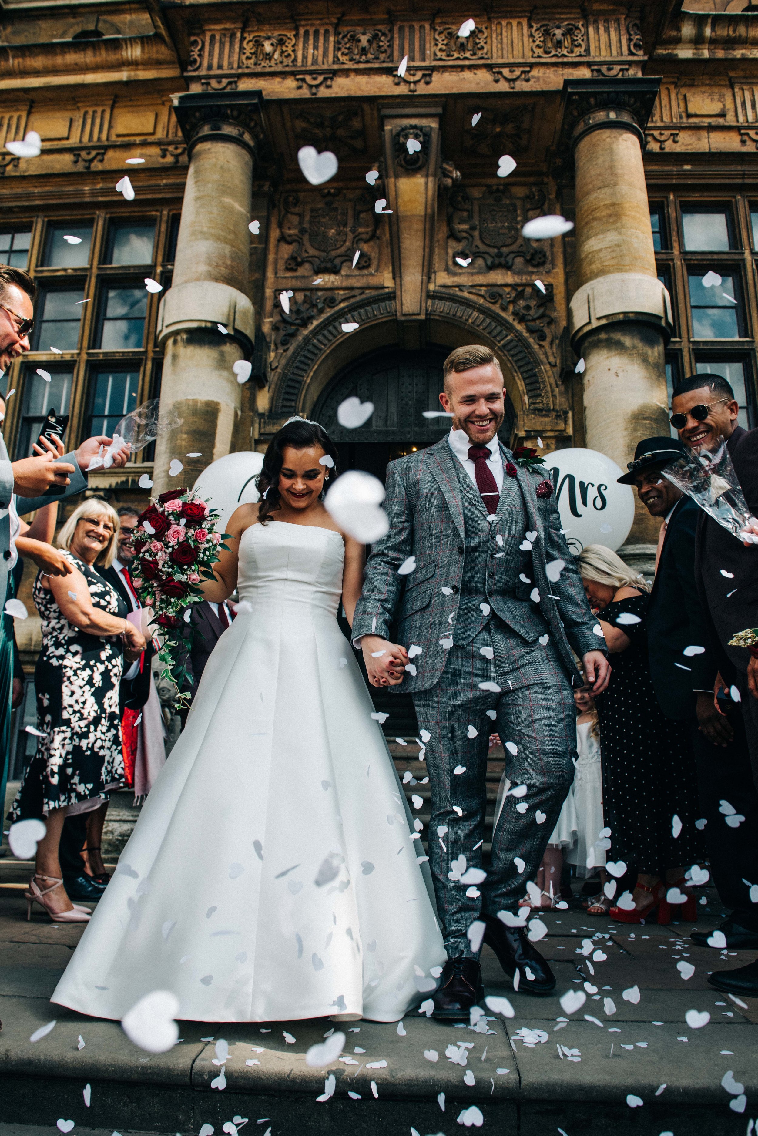 Wollaton Hall, Nottingham. David &amp; Sophie confetti time. Coales Capture Wedding Photography 