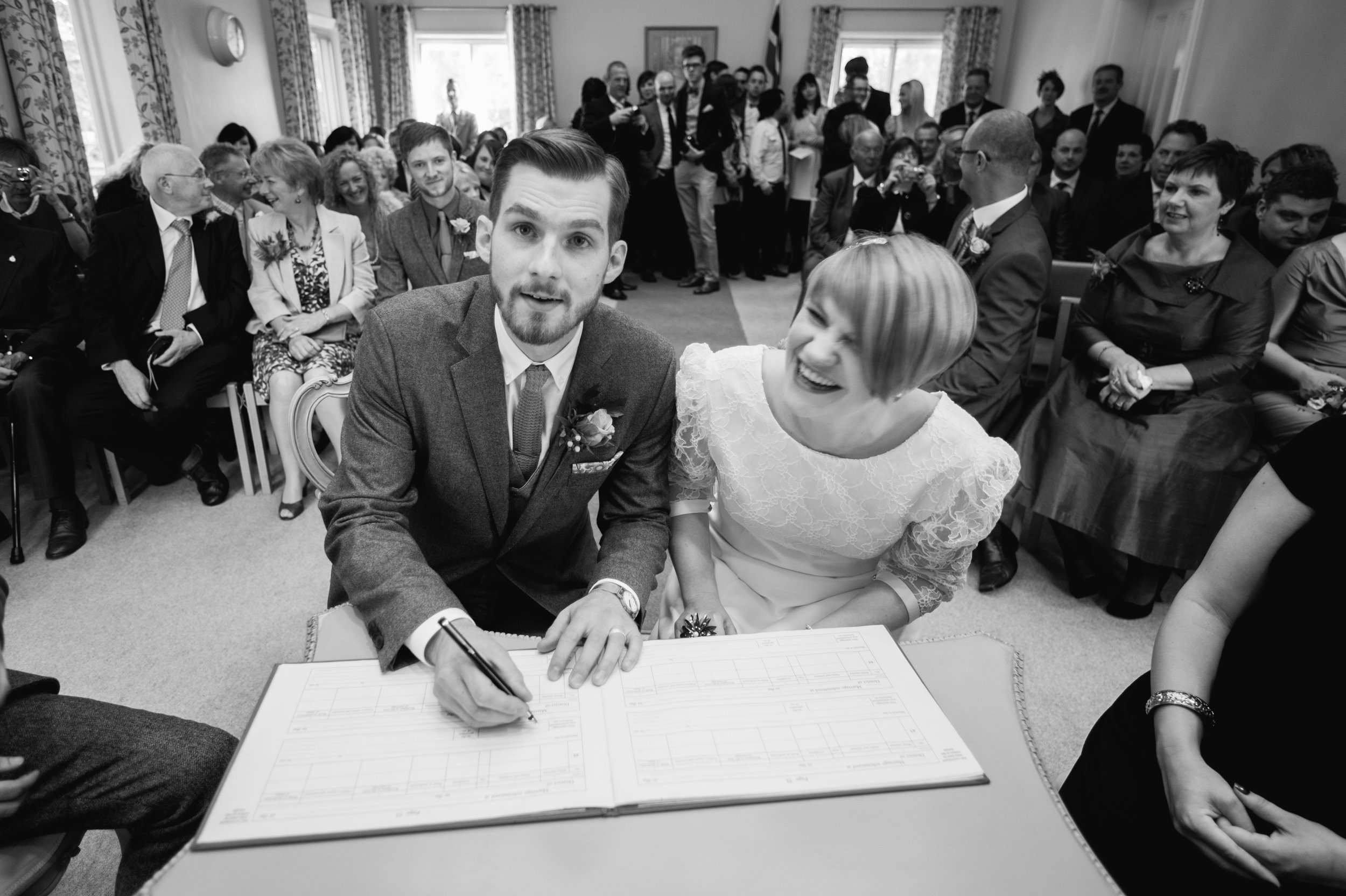 West Bridgford Registry Office, Nottingham. Signing the book. Coales Capture wedding Photography 