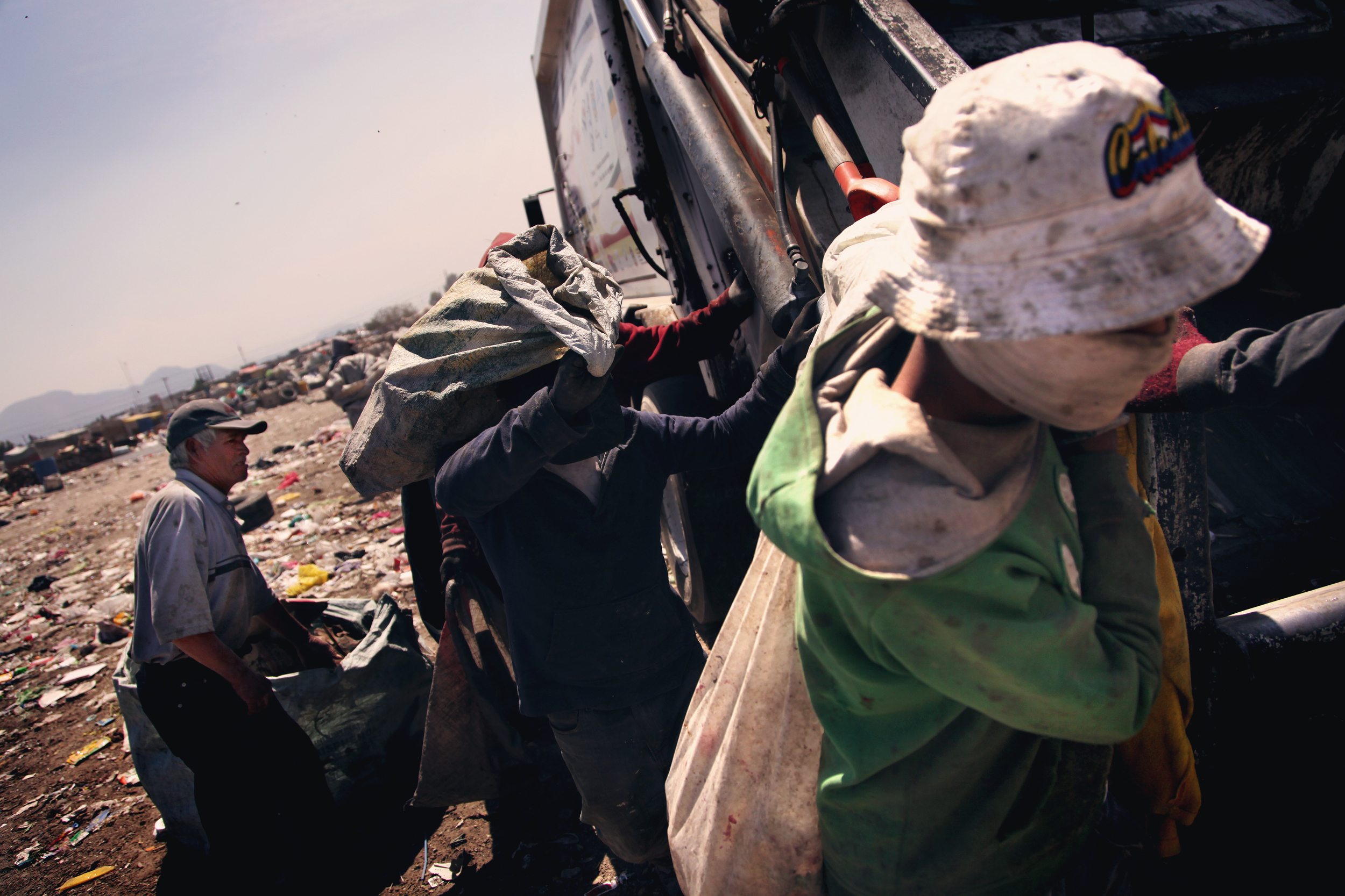   Pepenadores, or “waste pickers”, operate in the landfills on the outskirts of Mexico City, where they often live with their families.  