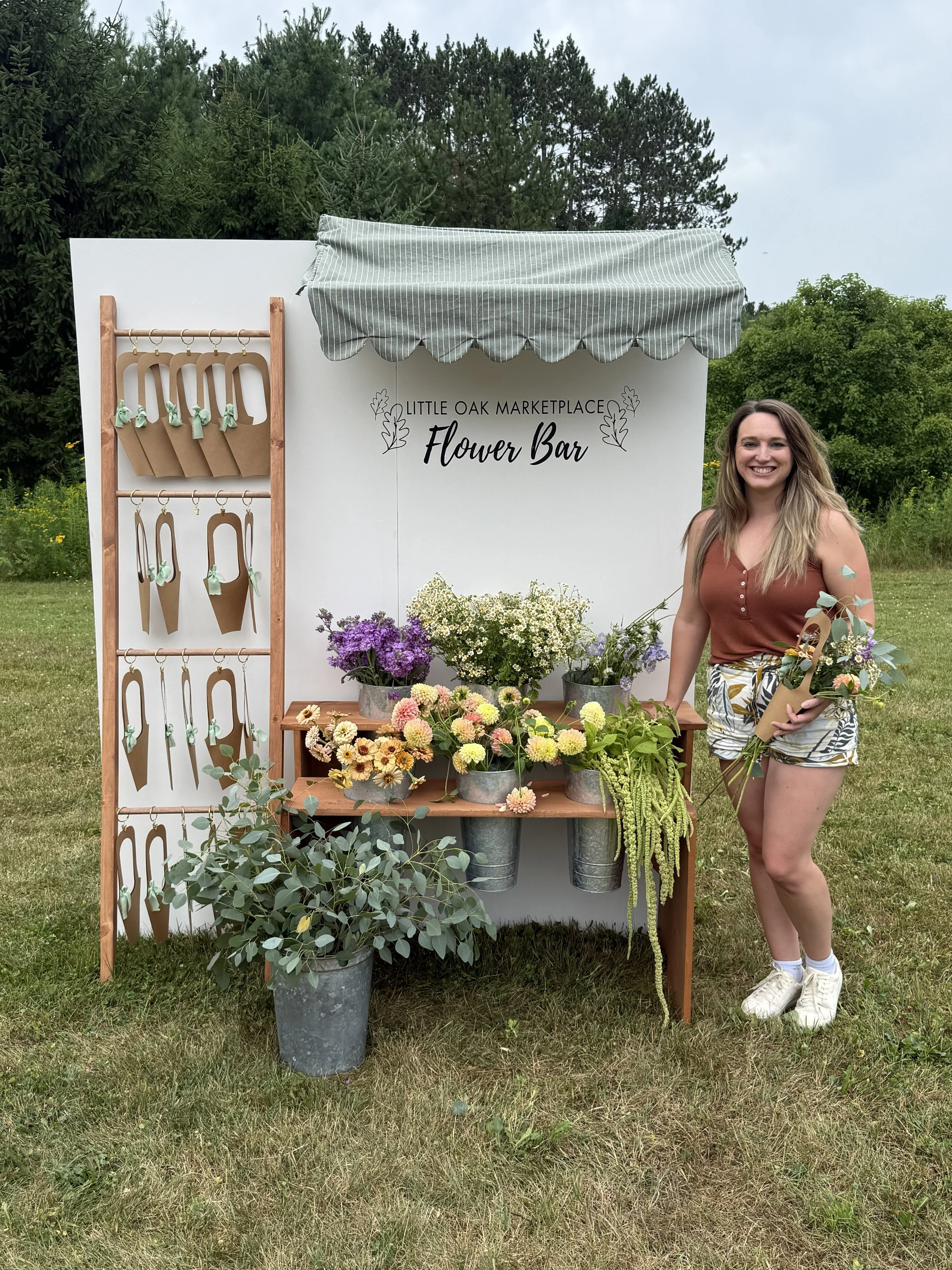 Little Oak Flower Bar DIY bouquet station set up for a corporate event in Wausau, WI, with fresh stems arranged for team building and employee appreciation