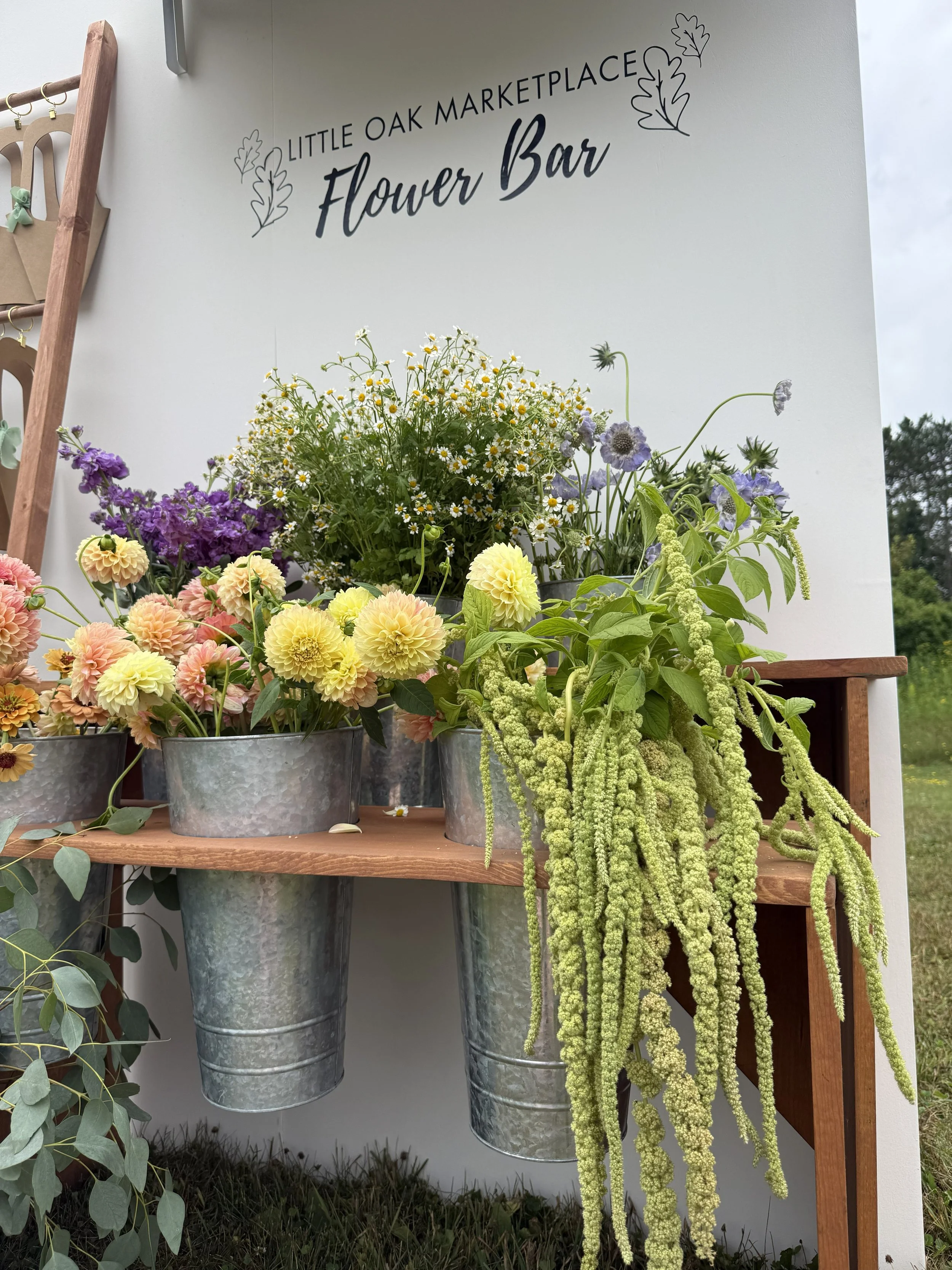 Little Oak Flower Bar flower bar setup for a bridal shower in Wausau, WI, featuring fresh stems for guests to design custom bouquets