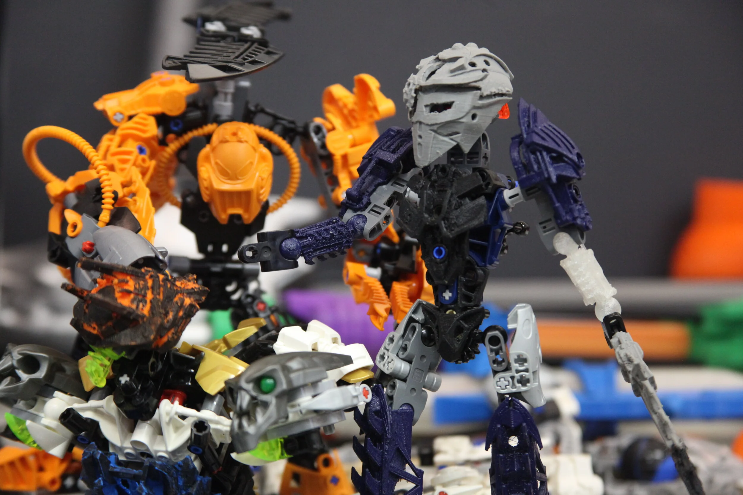  (Rotor aims his meteor blaster up to Artakha’s head, Tuyet reaches over and rips the mask off the builders face) 