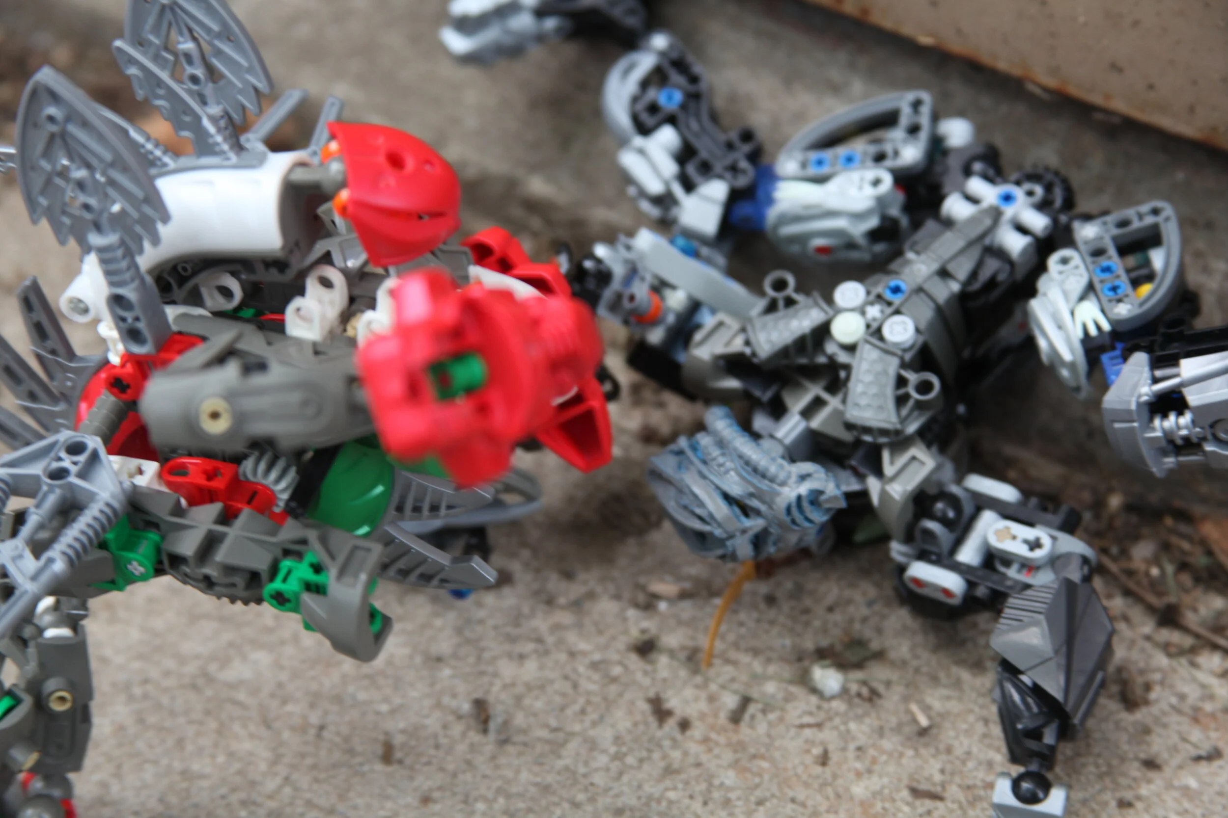  (Sylus notices his reflection in a piece of glass nearby and reaches for it) 