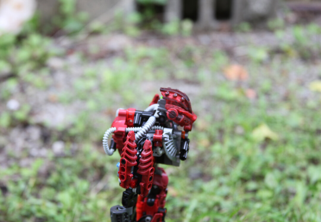 (He passes by until he notices movement like something in the shadows just moved, then he notices the conspicuous trail of oil leading further into the jungle)