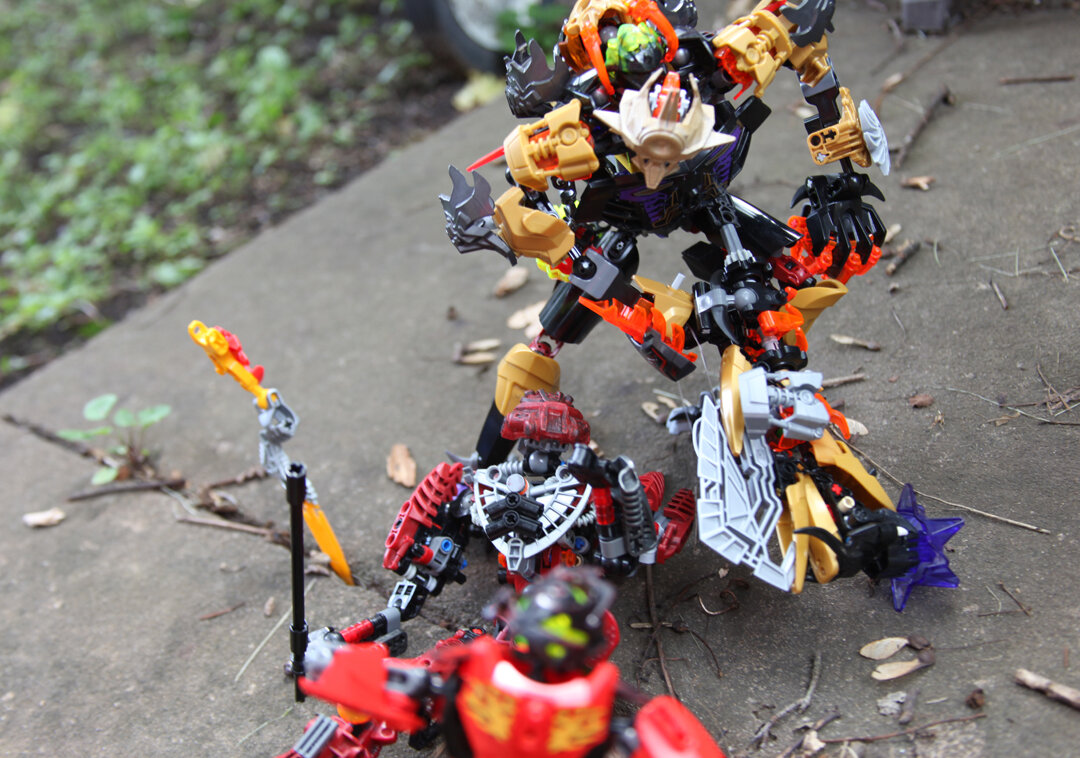 (Makuta’s massive maul swings right into Furno, blowing one of his arms off and sending him flying a short distance away)