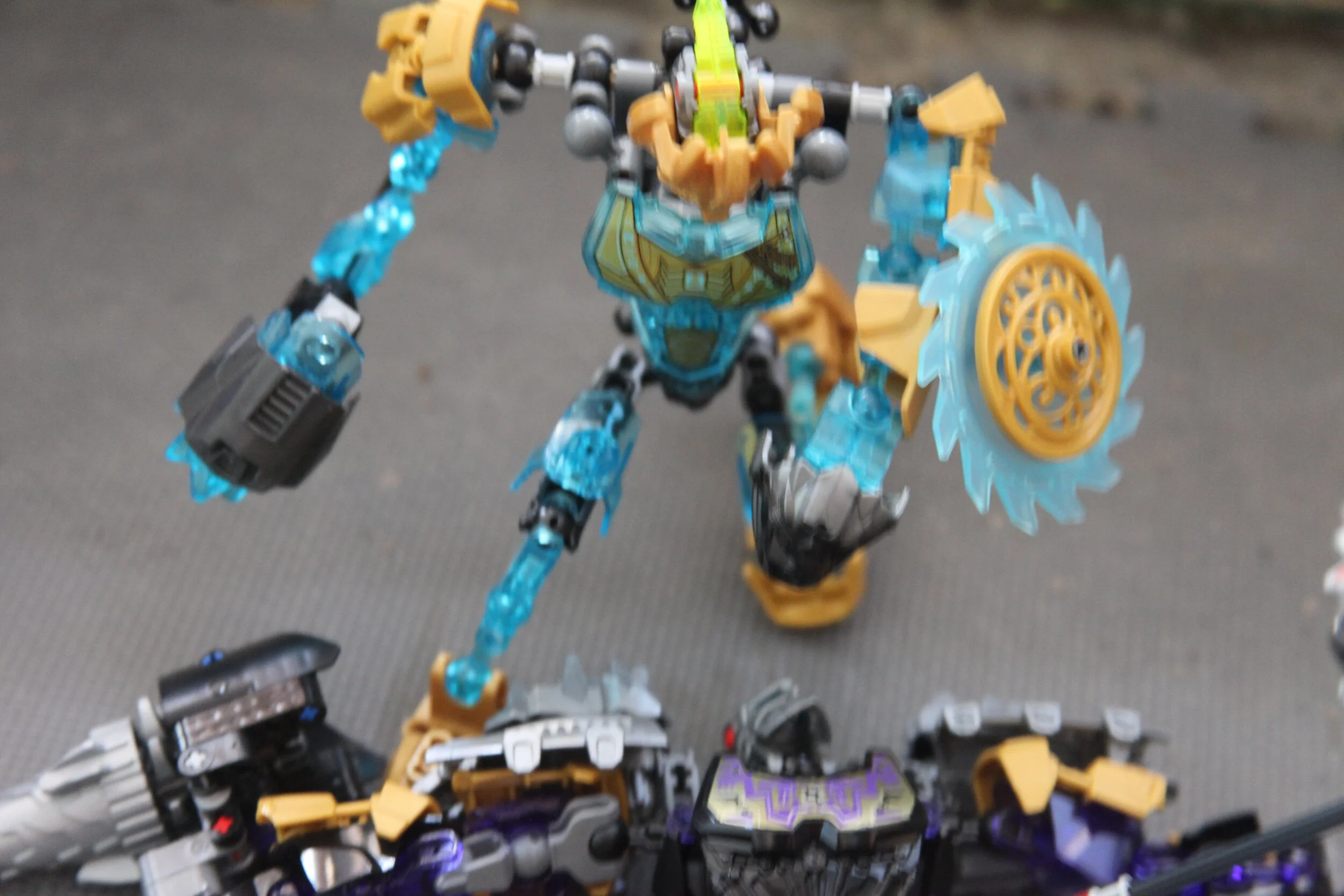  (Undeterred by this loss the young mask maker kneels down and fits the pristine mask over the comatose Onua) 