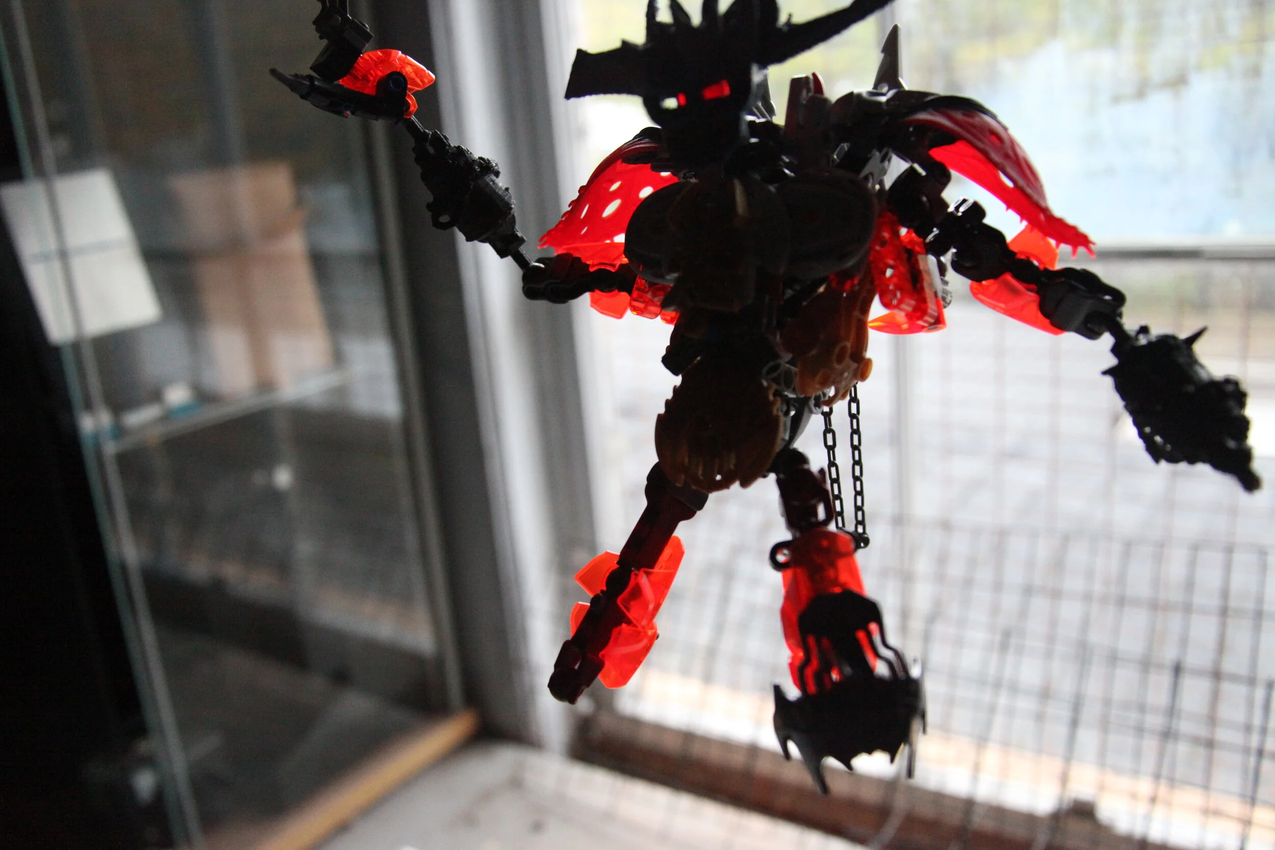  (Soon the charred body the mad tyrant begins to fall, parts of his body begin breaking off as more grey liquid continues leaking out everywhere) 