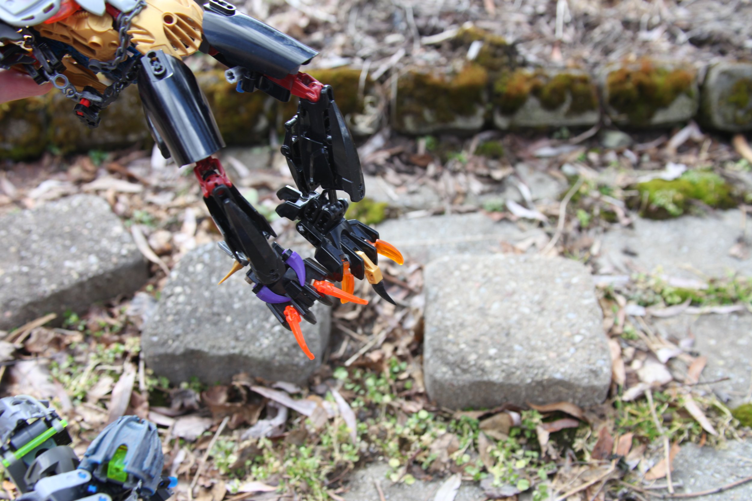 (Karzahni lurches himself off-screen where no one could reach him then he landed right behind the two remaining matoran onlookers) 