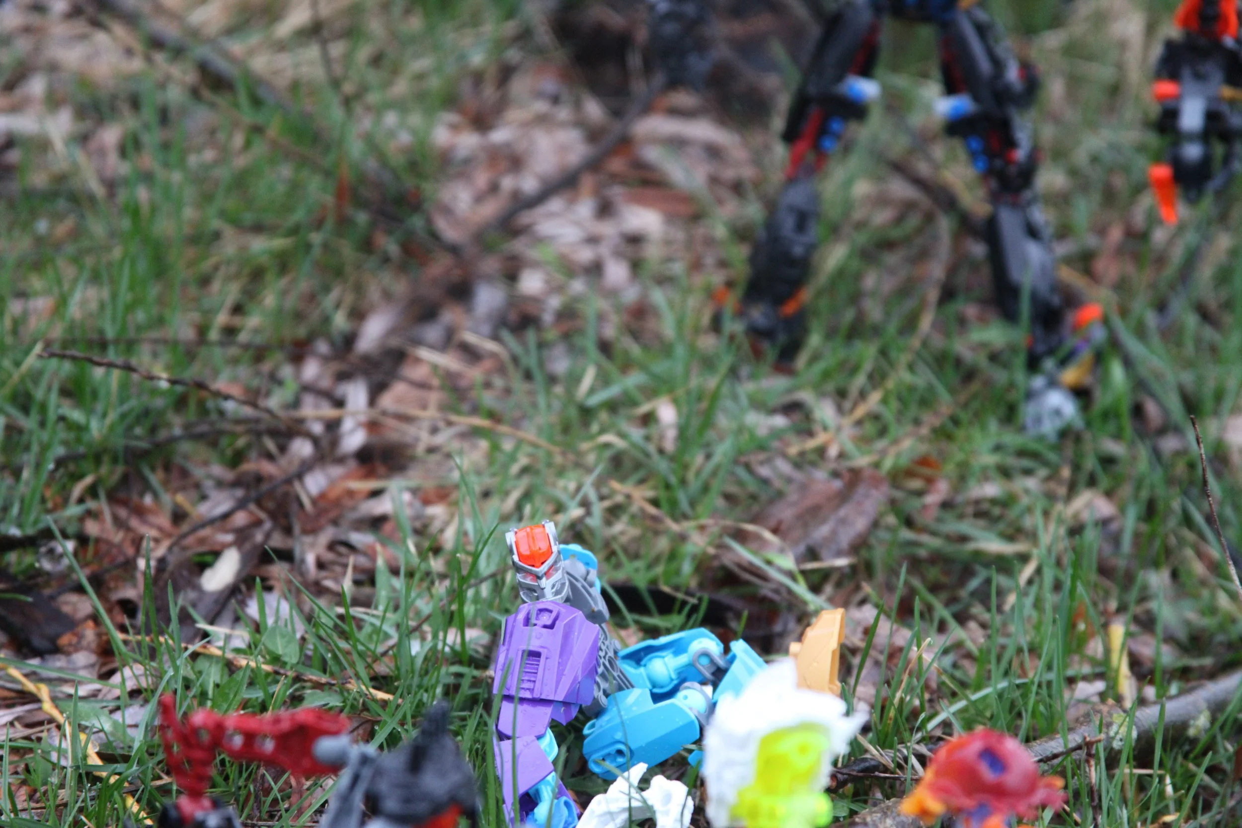  Karzahni:”And I know what a matoran looks like inside and out, literally.”  (Three mangled abominations fall from the tree branches surrounding Bisola from behind) 
