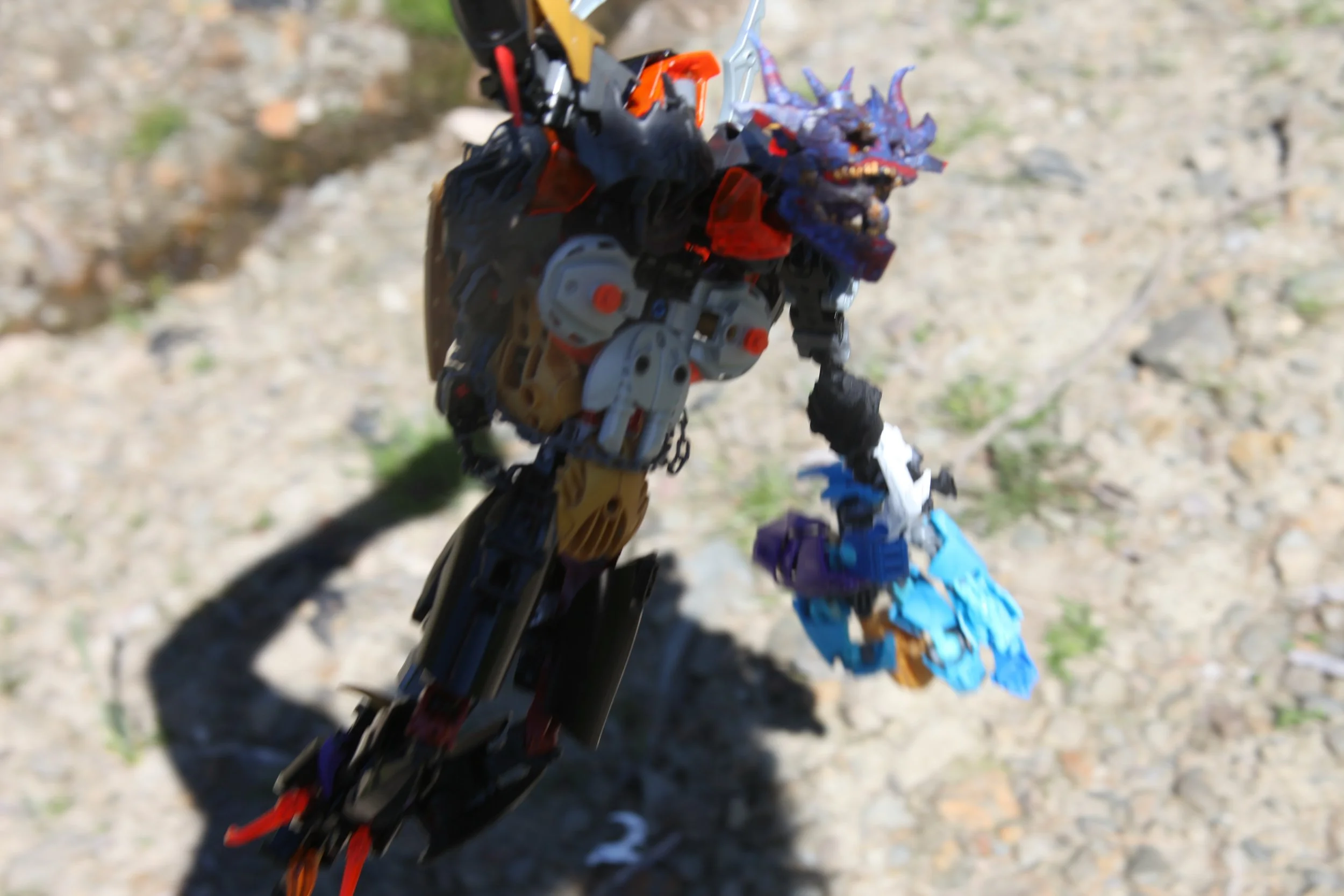  (Without warning, Karzahni lashes his new chain into the top of the screen border and swings away, Bisola in tow) 