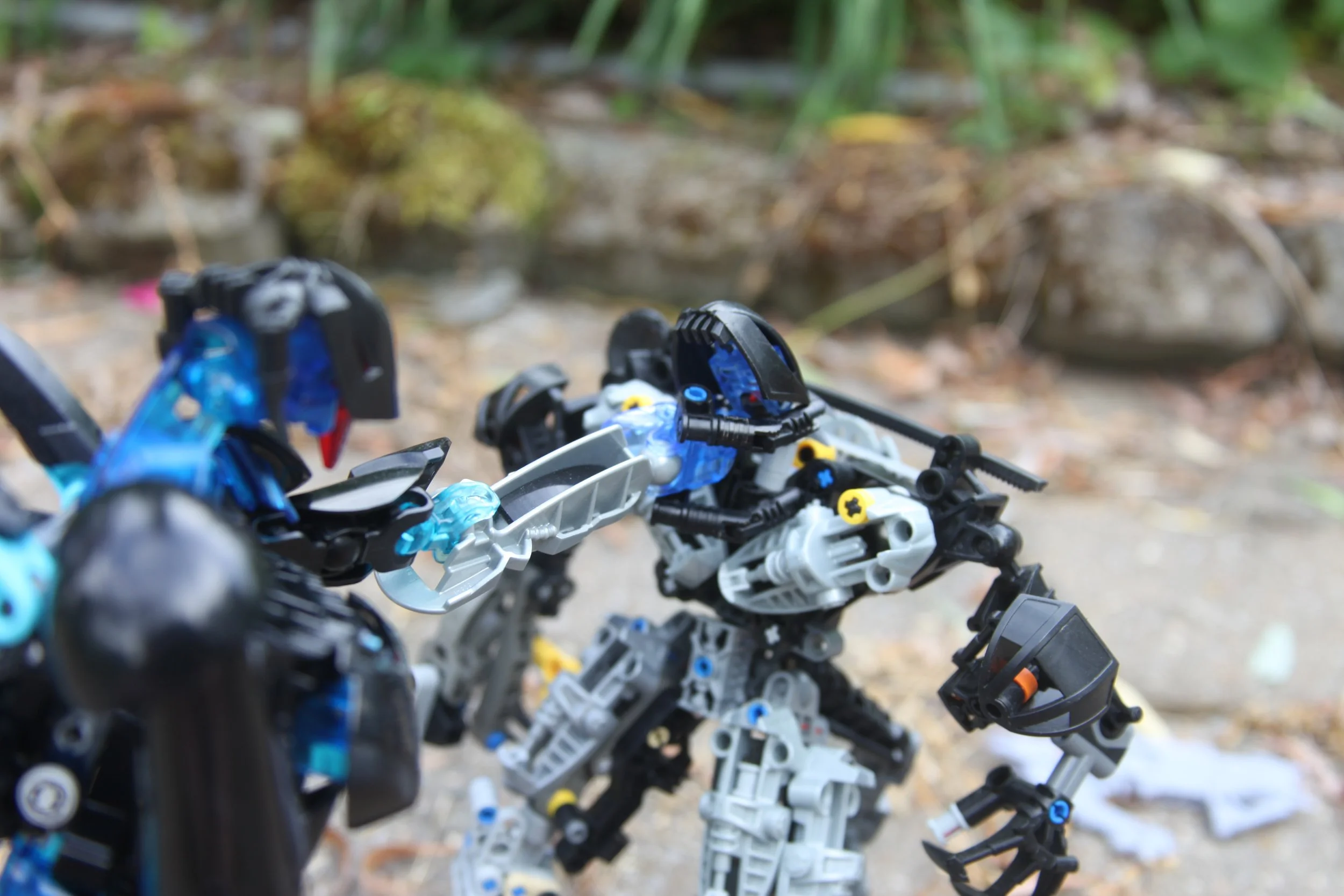  (Faster than anyone could react, The Marendar grasps Ancient by the neck and knocks Tahu onto his knees) 