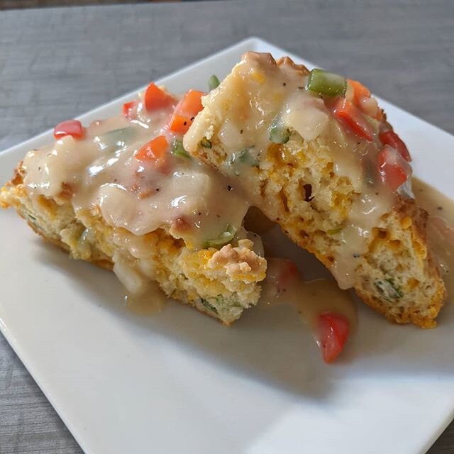 Good Morning. Today's brunch specials are Cheddar and Green Onion Scones topped with a Pepper Gravy and a Veggie Omlette both served with Tots. Adult Beverages as well. Enjoy your Saturday