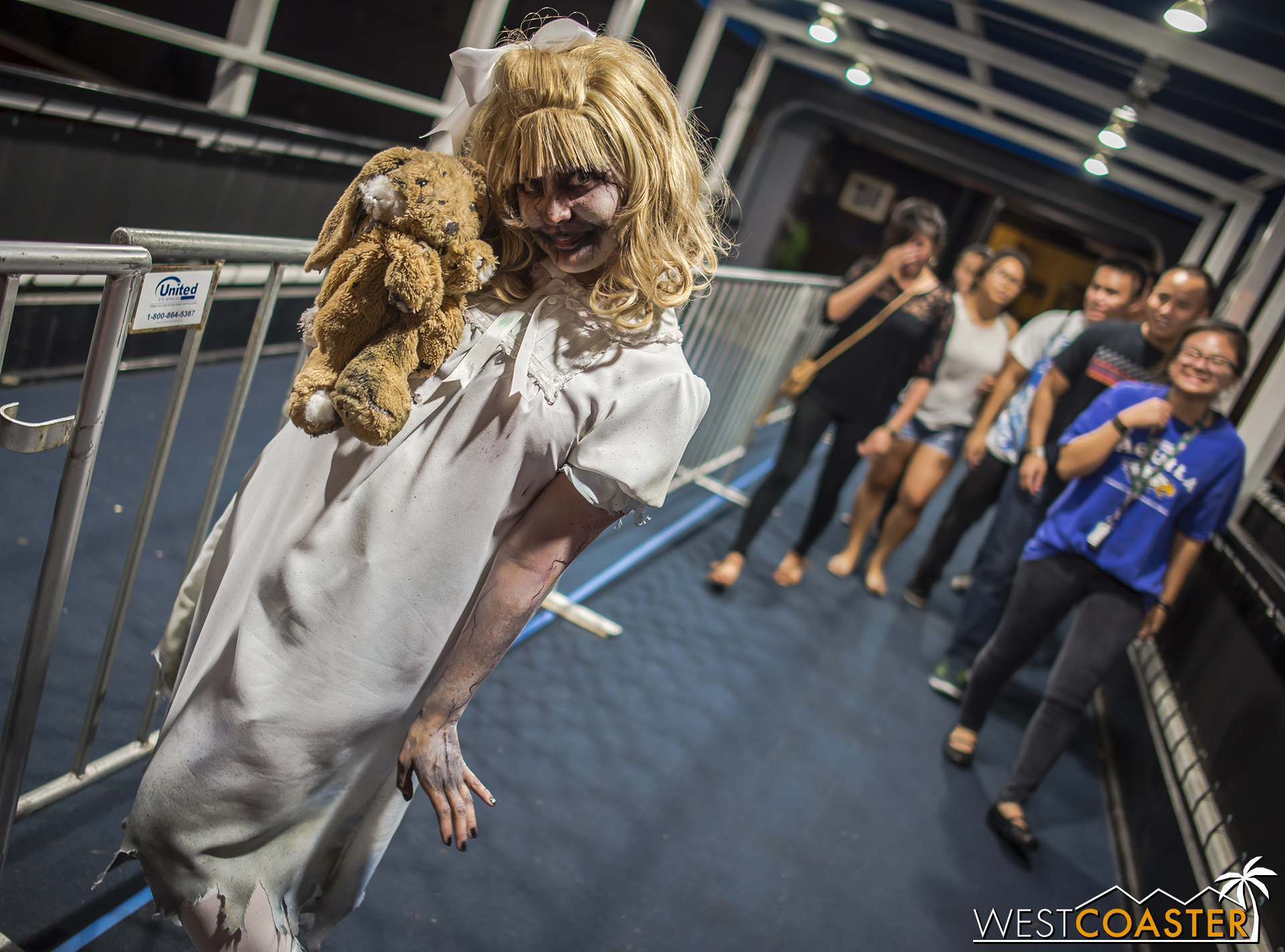 Scary Mary poses outside her maze, Lullaby, which premiered last year at Dark Harbor.