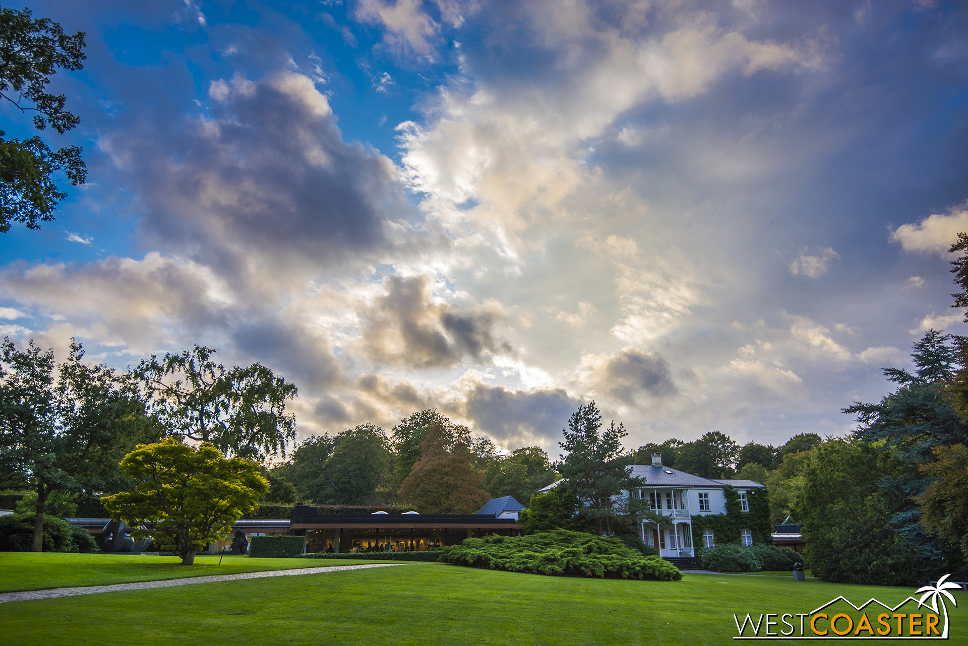 The Lousiana Museum is basically an old estate converted into a museum for modern art but also features a verdant backyard lawn that also affords views across the Øresund Strait to Sweden.
