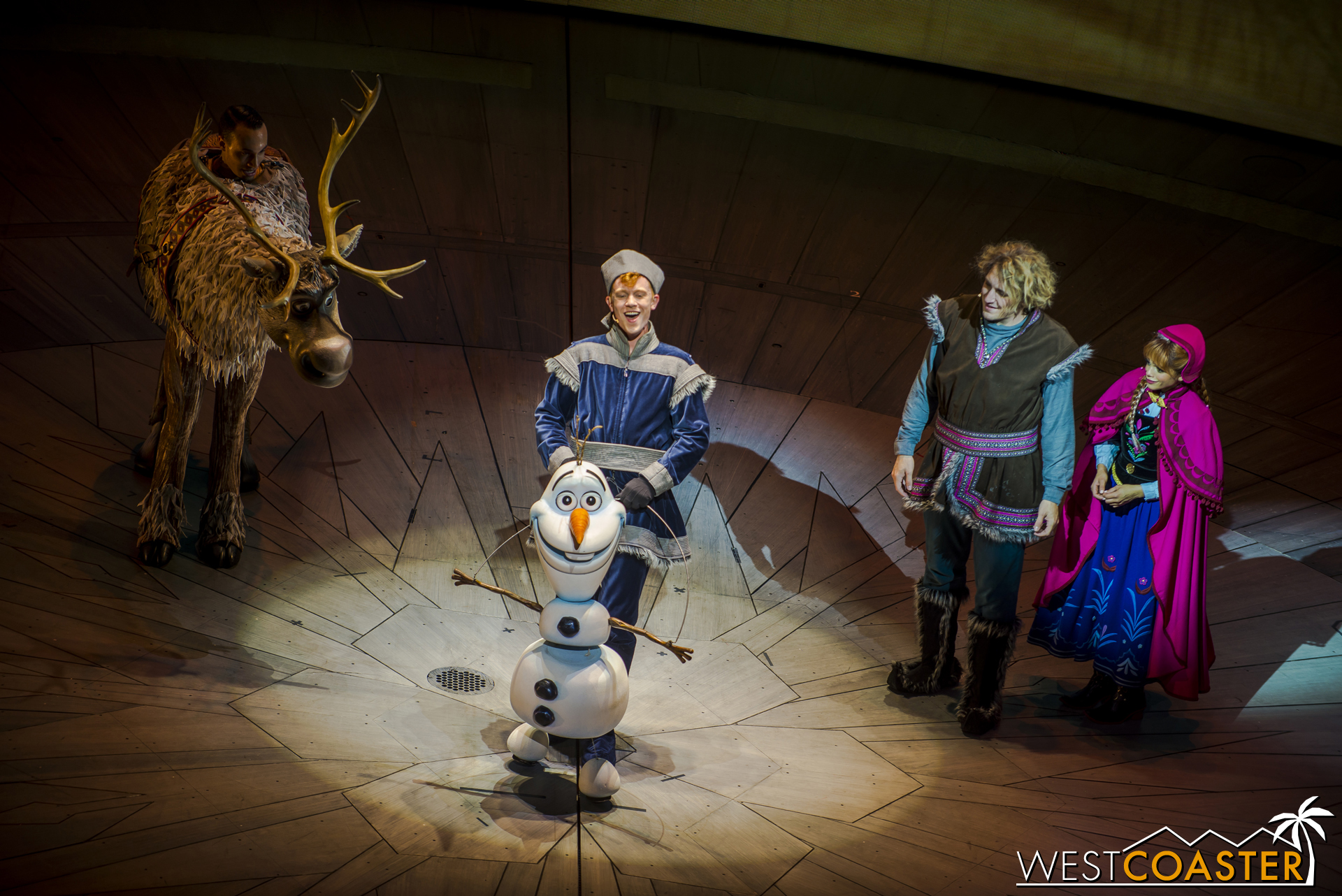  Kristoff and Anna marvel at Olaf's powers, but the magical snowman simply explains, "It's all in the warm hugs." 