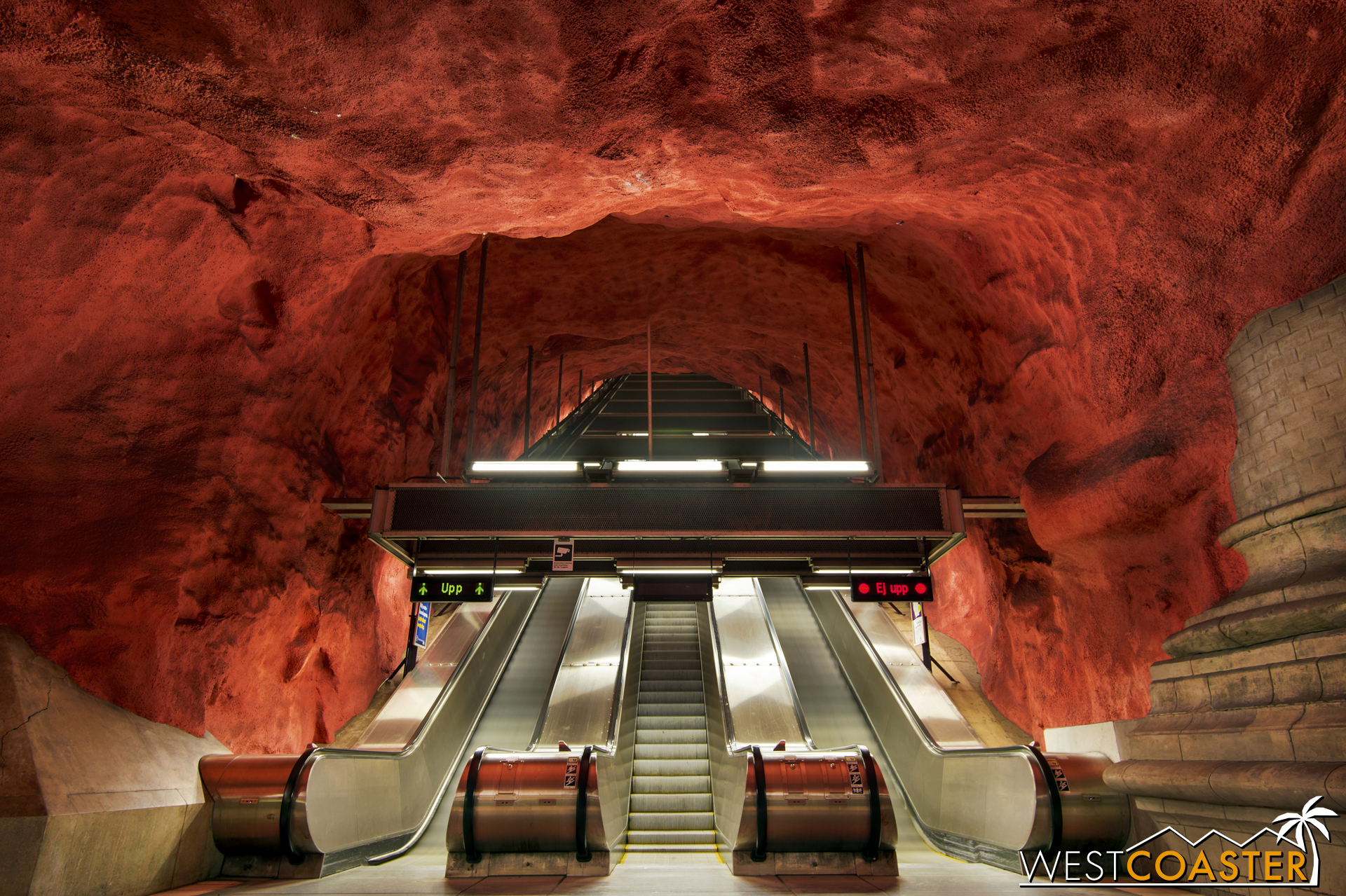 The T-Bana's Radhuset station features what is made out to be an ethereal cavern of exposed red bedrock, as though the rail line was routed into this mystical subterranean chamber.