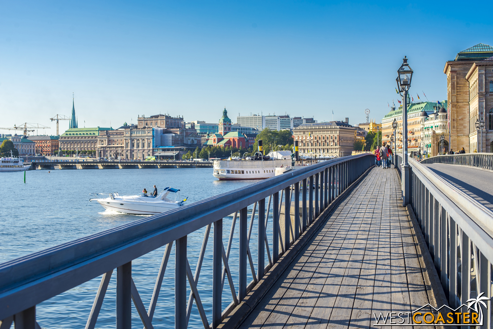 A stroll along the photogenic waterfront of Norrmalm by the Grand Hotel Stockholm features pricey properties and beautiful sights.