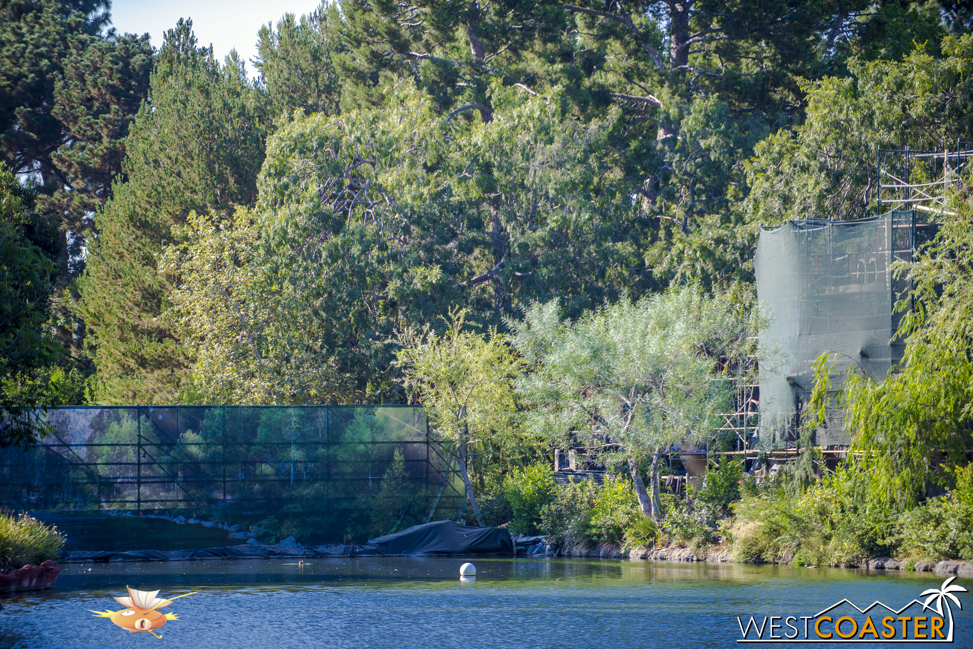  The dam on the west side of the Rivers of America.&nbsp; As you can see from the "Star Wars" Land construction photos, it is dirt immediately behind this tarp. 