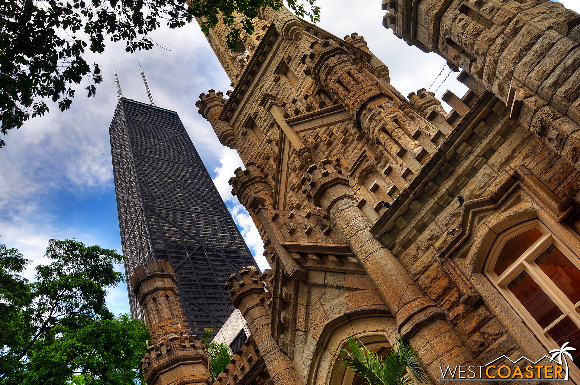 The Hancock Tower in the background, behind the historic Water Tower, one of the few structures in the city to survive the 1871 Great Fire.