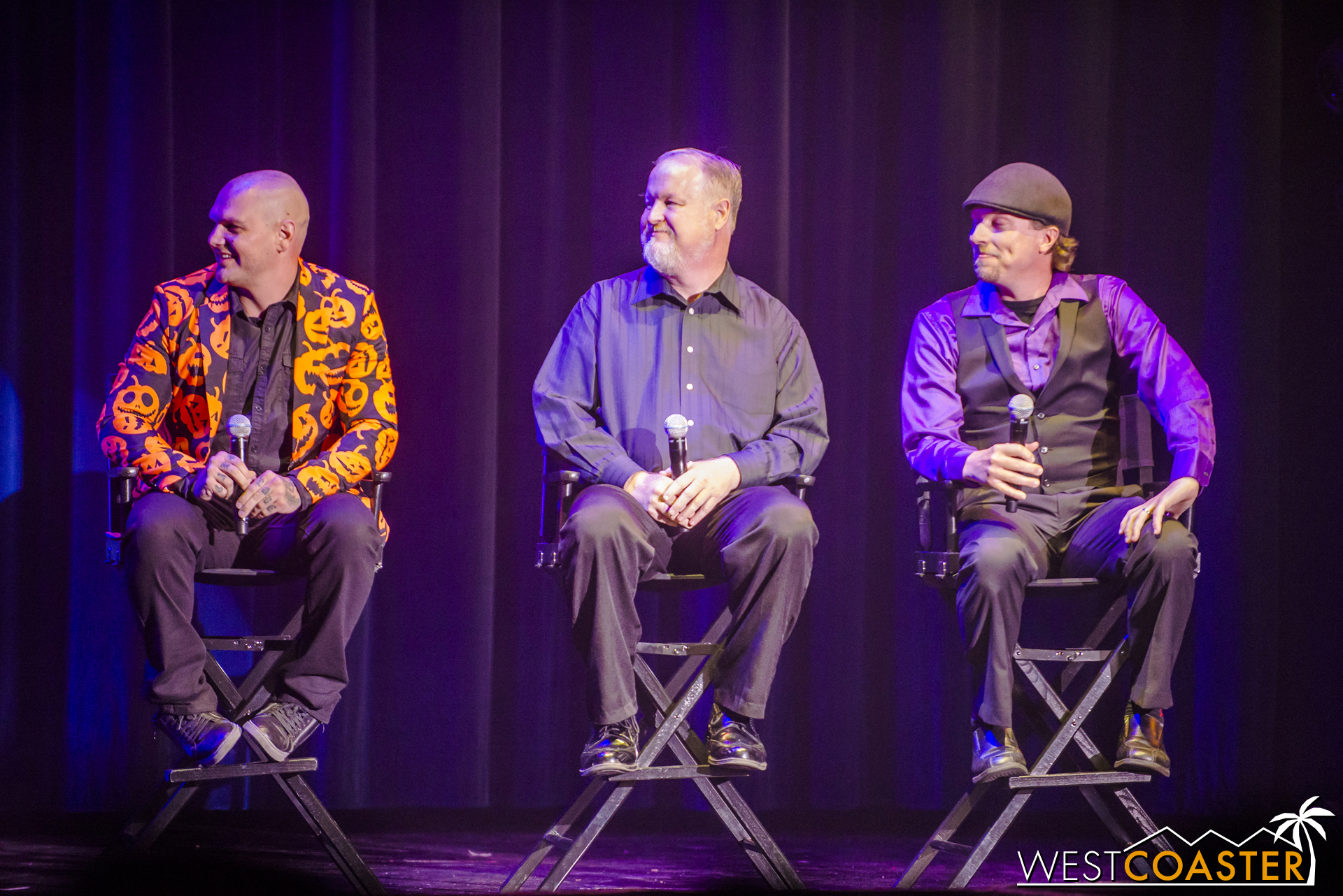  Designers Jon Cooke, Daniel Miller, and Gus Krueger (left to right) on stage to discuss their work.   