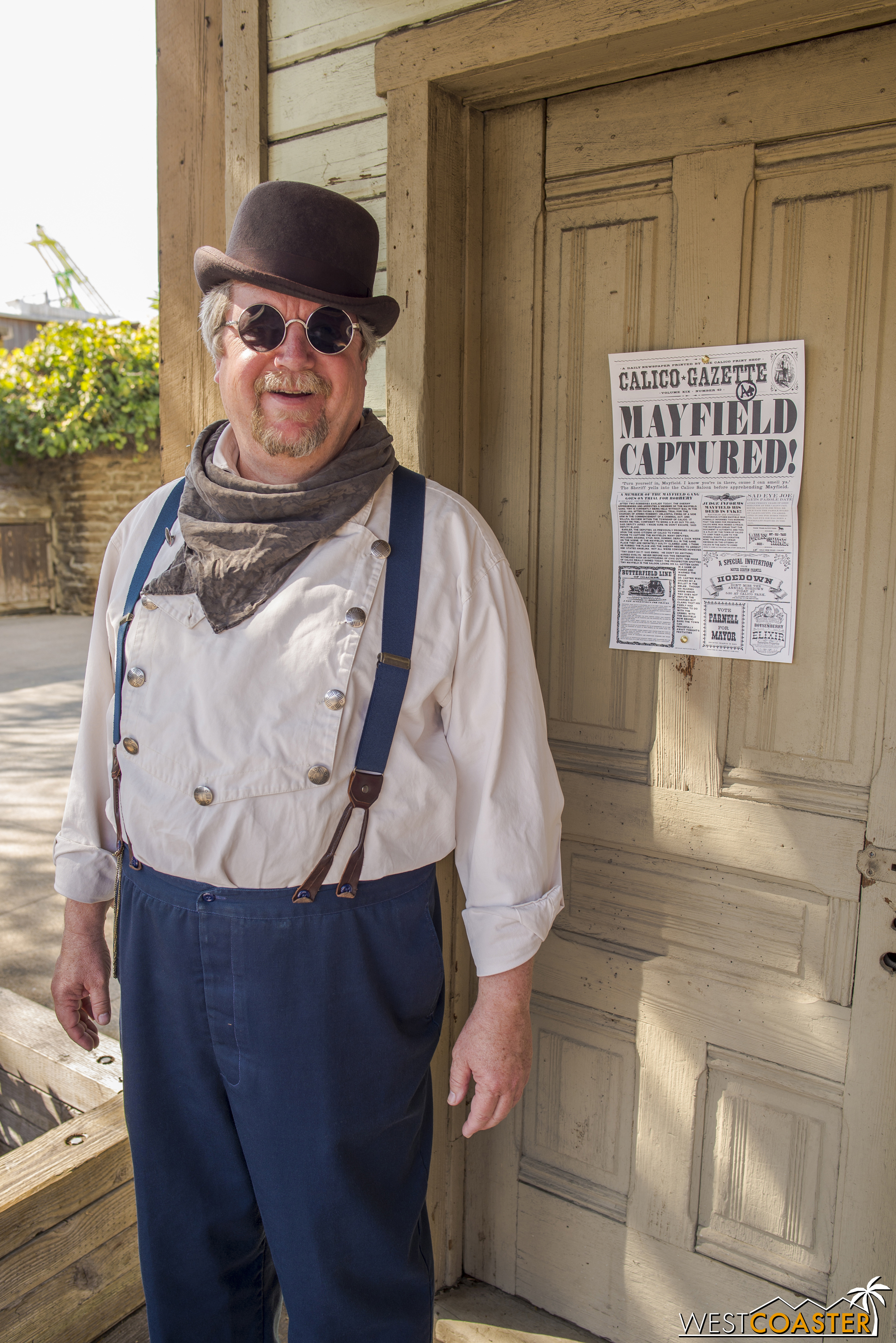  The Postmaster poses with his stylish sunspectacles. 