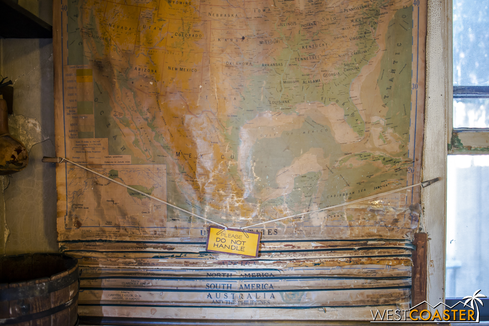  An old map hanging on the side. 