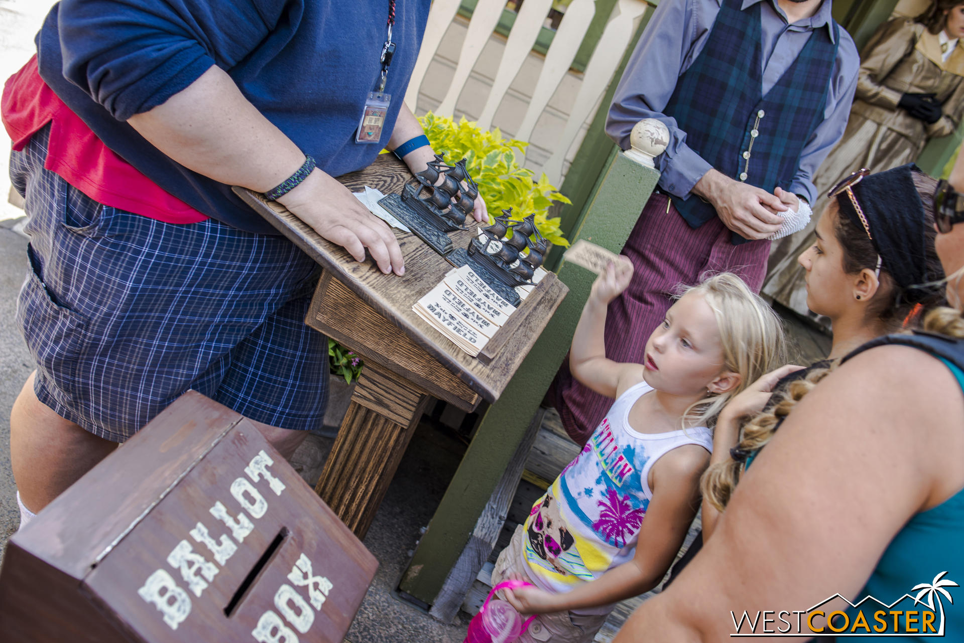  A young honorary Calico citizen casts her vote. 