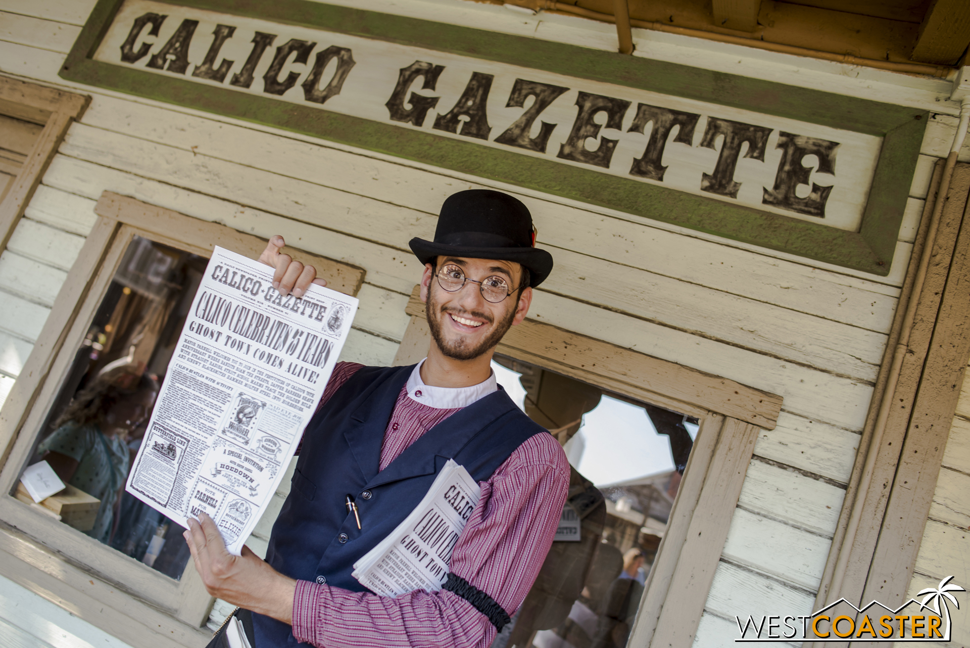  The  Calico Gazette  editor poses with the latest edition of the paper.   