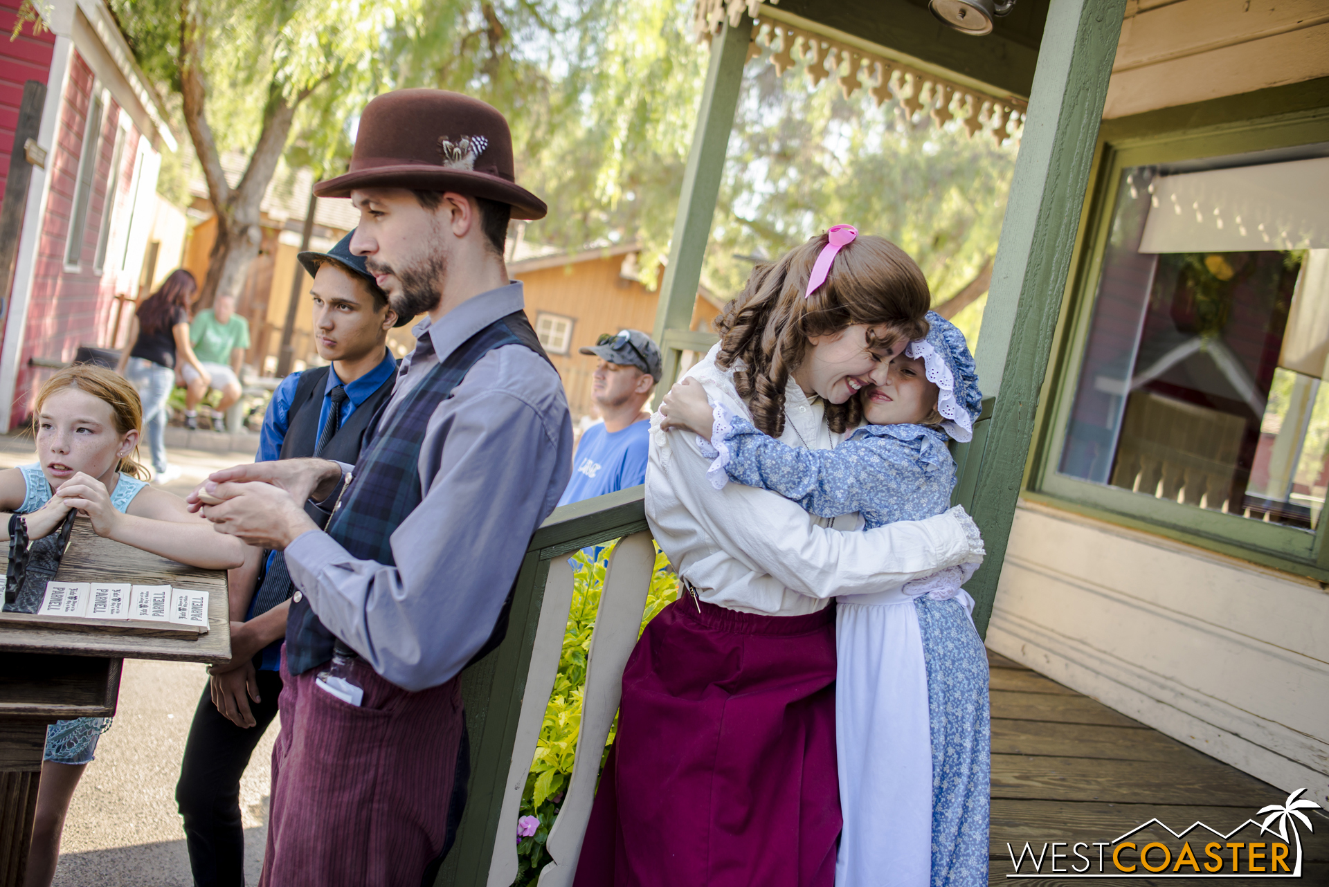  One of many beautiful moments at Ghost Town Alive!, Chelsea gives a young town citizen a hug.&nbsp; For many kids, Ghost Town Alive! has been a magical experience of live theater, and they have returned on multiple occasions to engage in the product