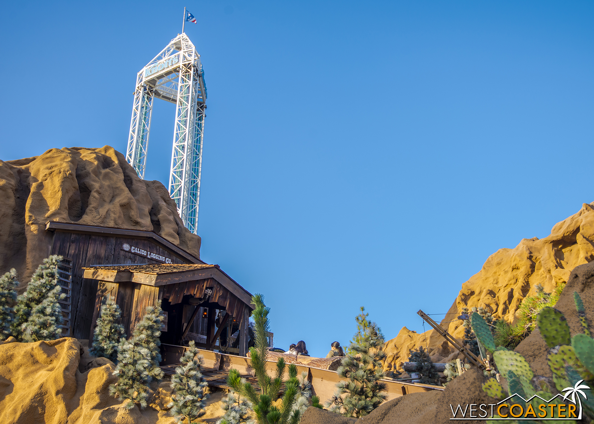  A log goes up the first lift hill of the Log Ride. 