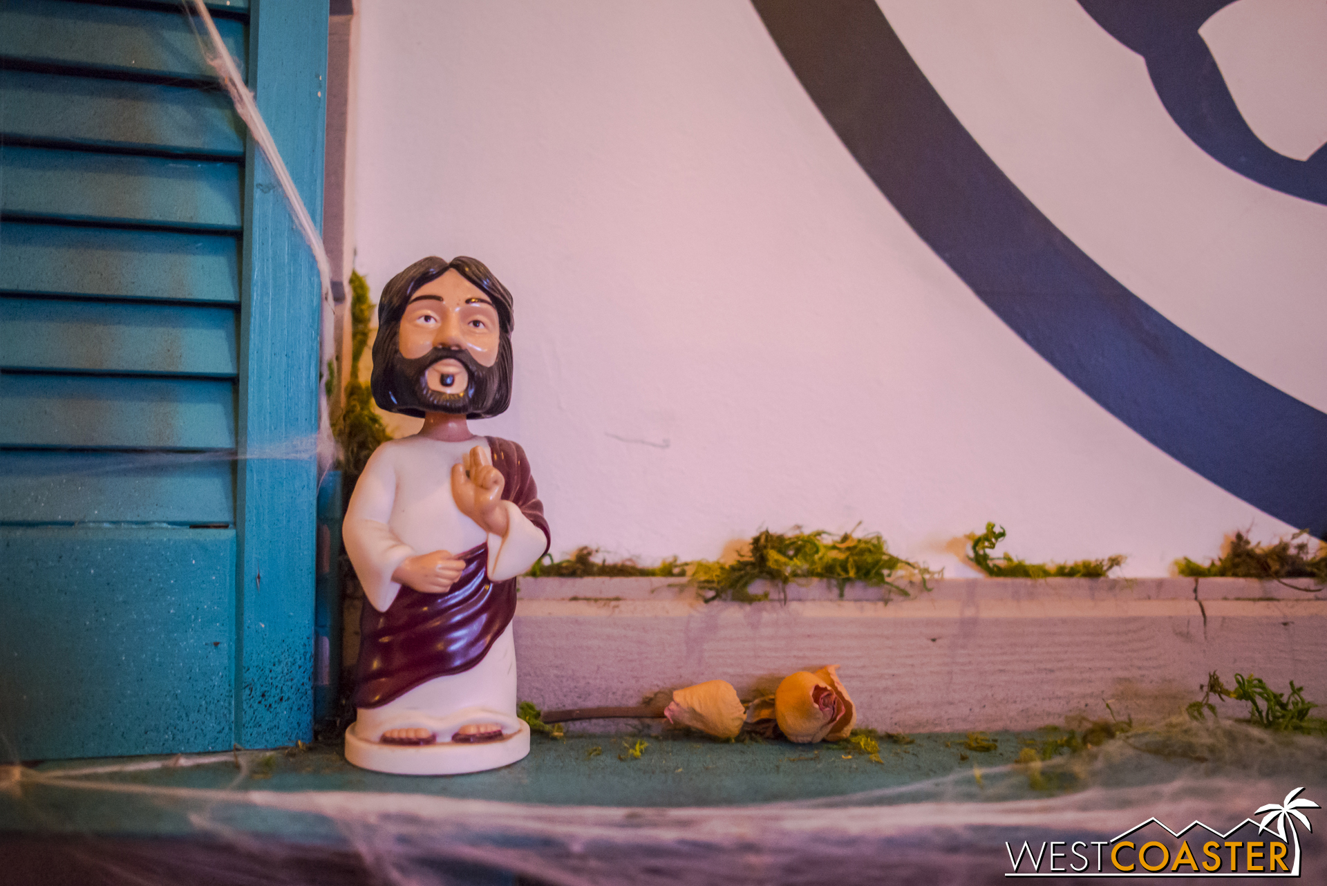 The maze dumped guests into a bar and lounge area, apparently watched by this Bobblehead Jesus. 