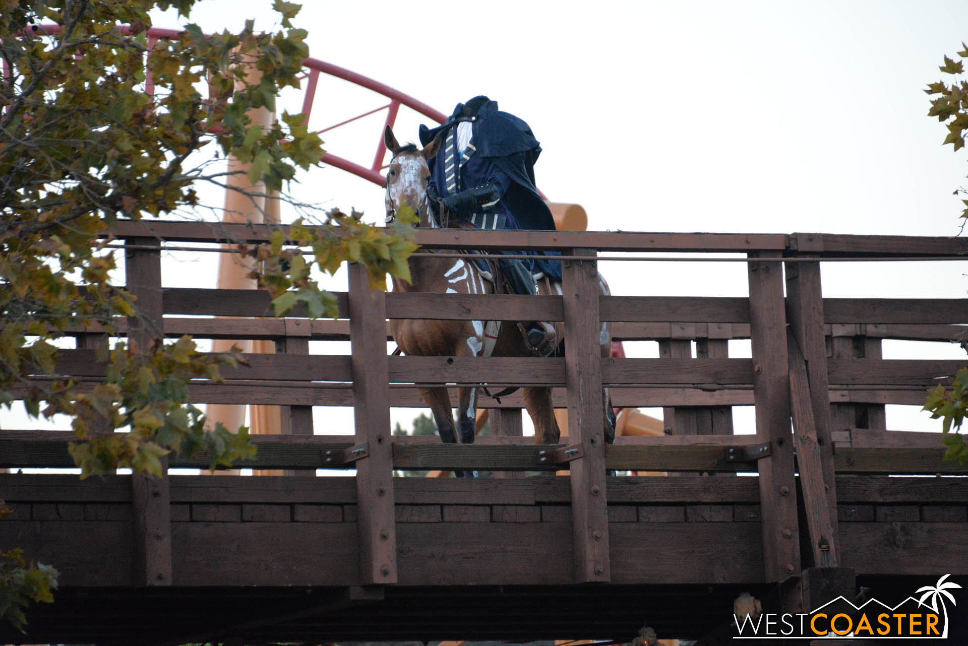  And before the event begins, the Headless Horseman takes a trot over the Stagecoach bridge to observe the evening's victims--er, guests. 