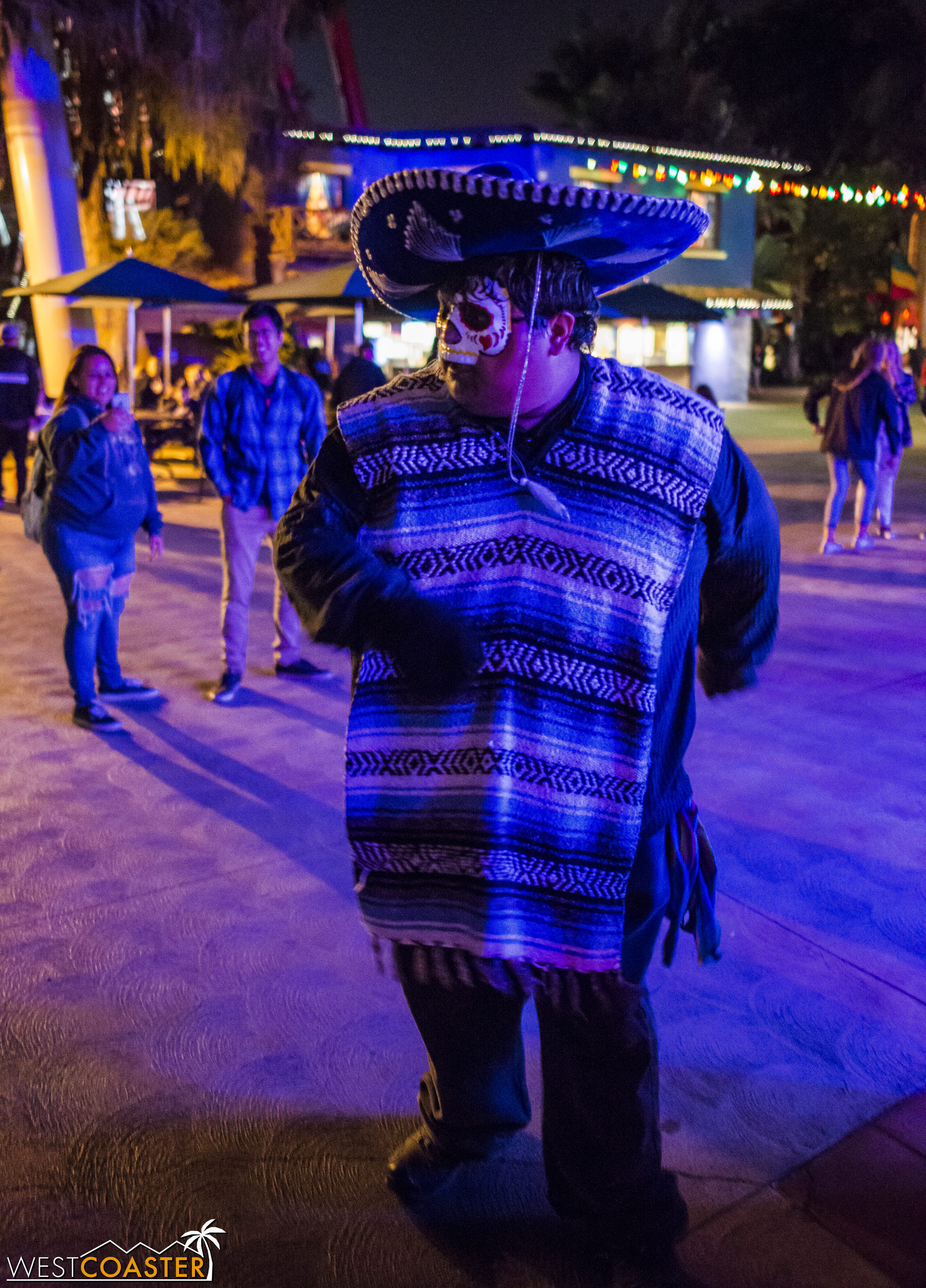  Fiesta monsters are not afraid to goof around.&nbsp; This one dances to the beat of the music before suddenly turning and scaring a neighboring guest. 