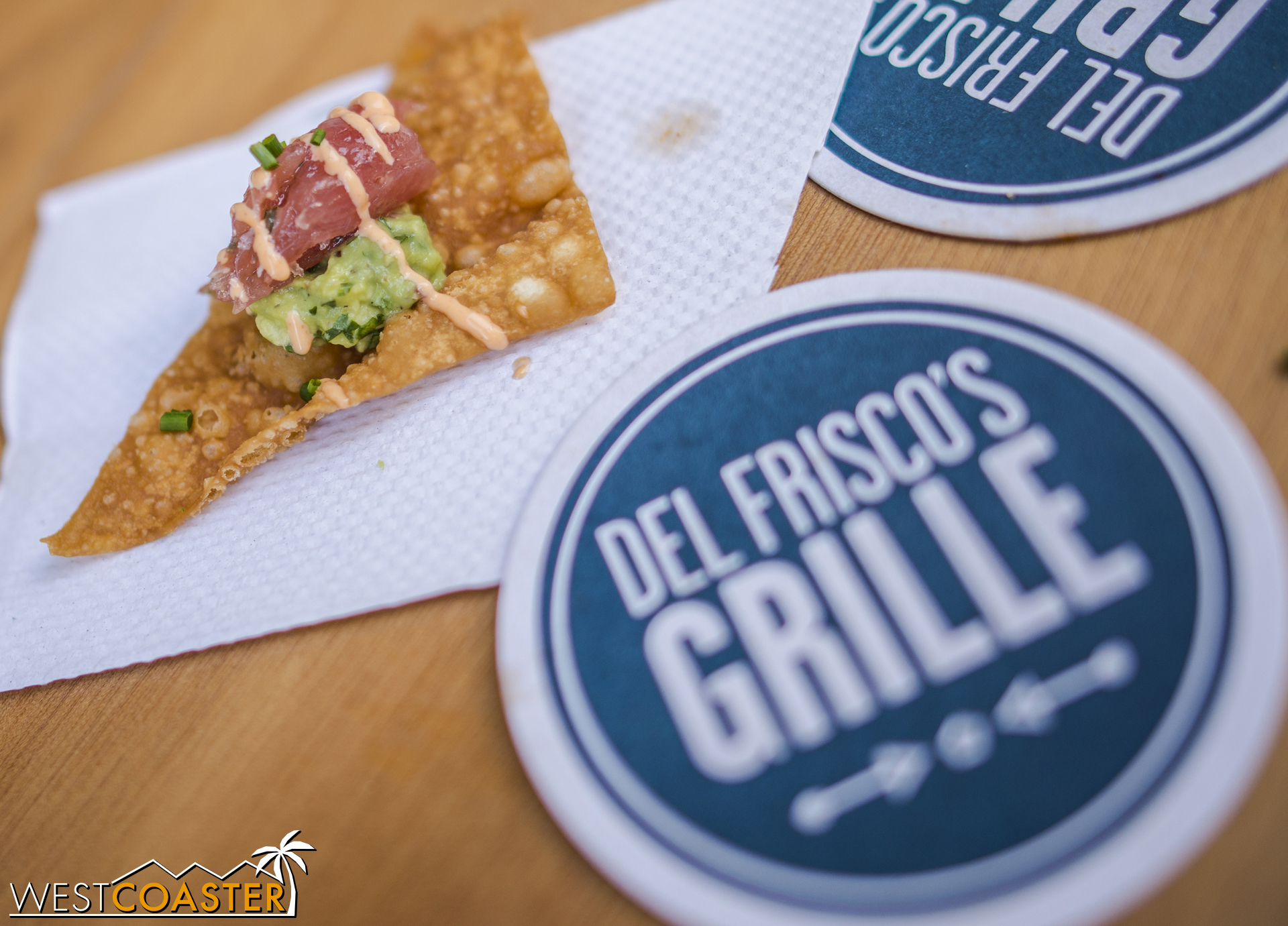  Local restaurant Del Frisco's Grille had "ahi tacos" (more like ahi tuna with fresh guacamole and a cilantro lime sauce over a sweet tortilla chip) samples.&nbsp; They were delicious! 