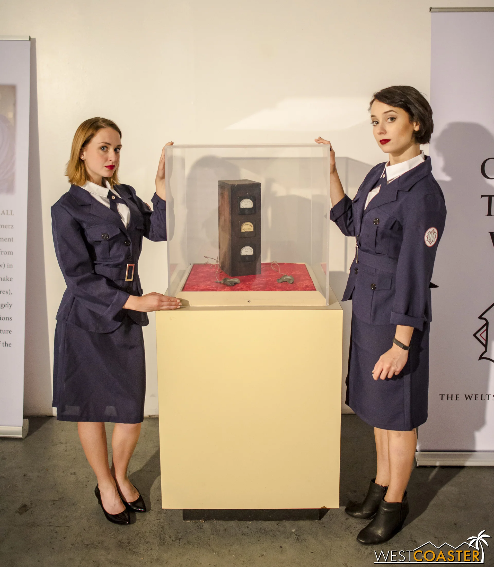 The ladies present a primitive testing tool that Dr. Weltschmerz developed to test candidates' perfection. It may have been painful.