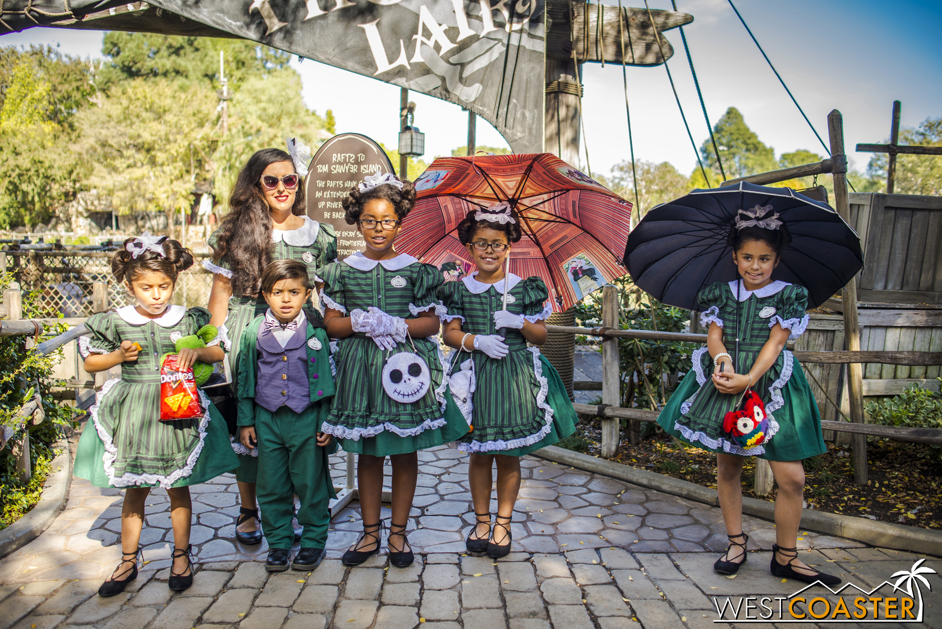  This family of Haunted Mansion hostesses and host were absolutely adorable. 
