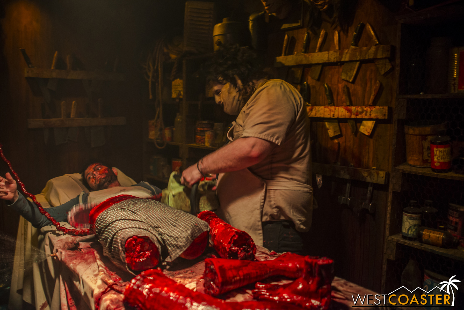  Inside the haunted house, Leatherface is working on arts and crafts. 