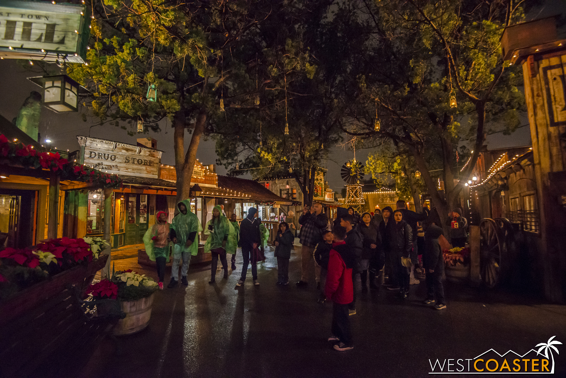 Guests gather in advance of the twice-nightly Snow and Glow moment in Ghost Town.