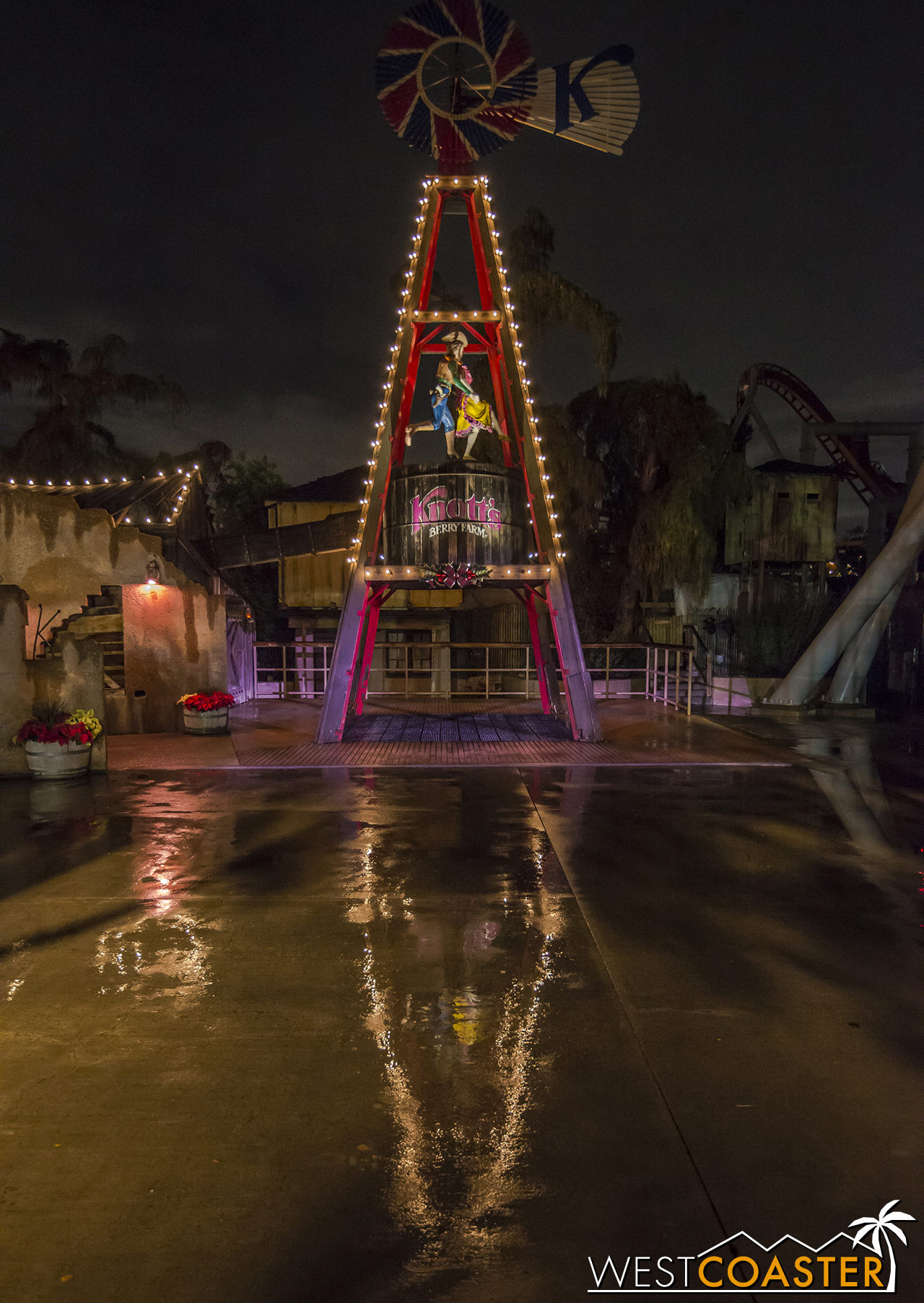 A parting shot... the windmill casts a nice reflection on the wet pavement on this rainy evening.