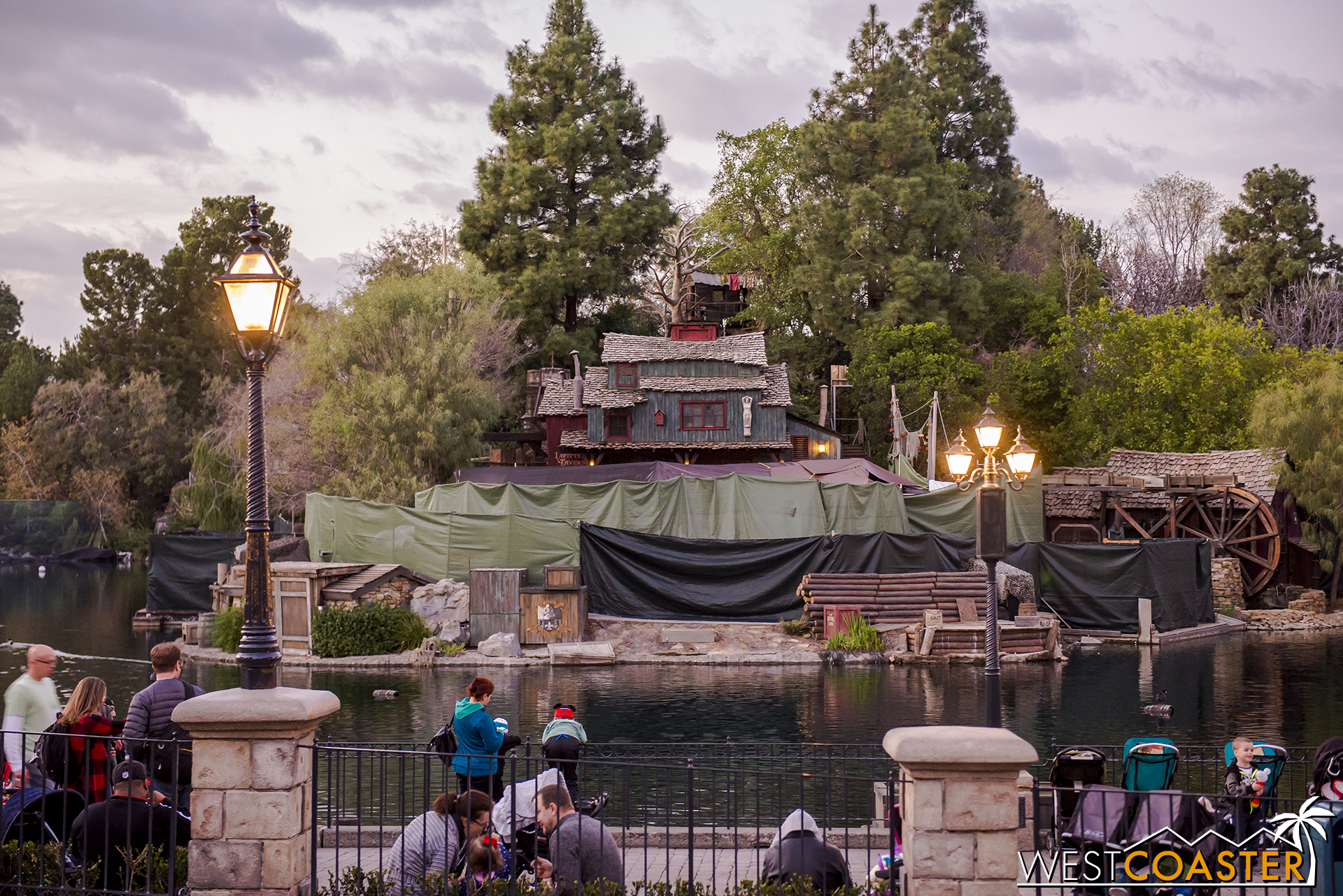  Curiously, tarps are up around the front of Tom Sawyer's Island now, even though they weren't when the building facades were being painted. 