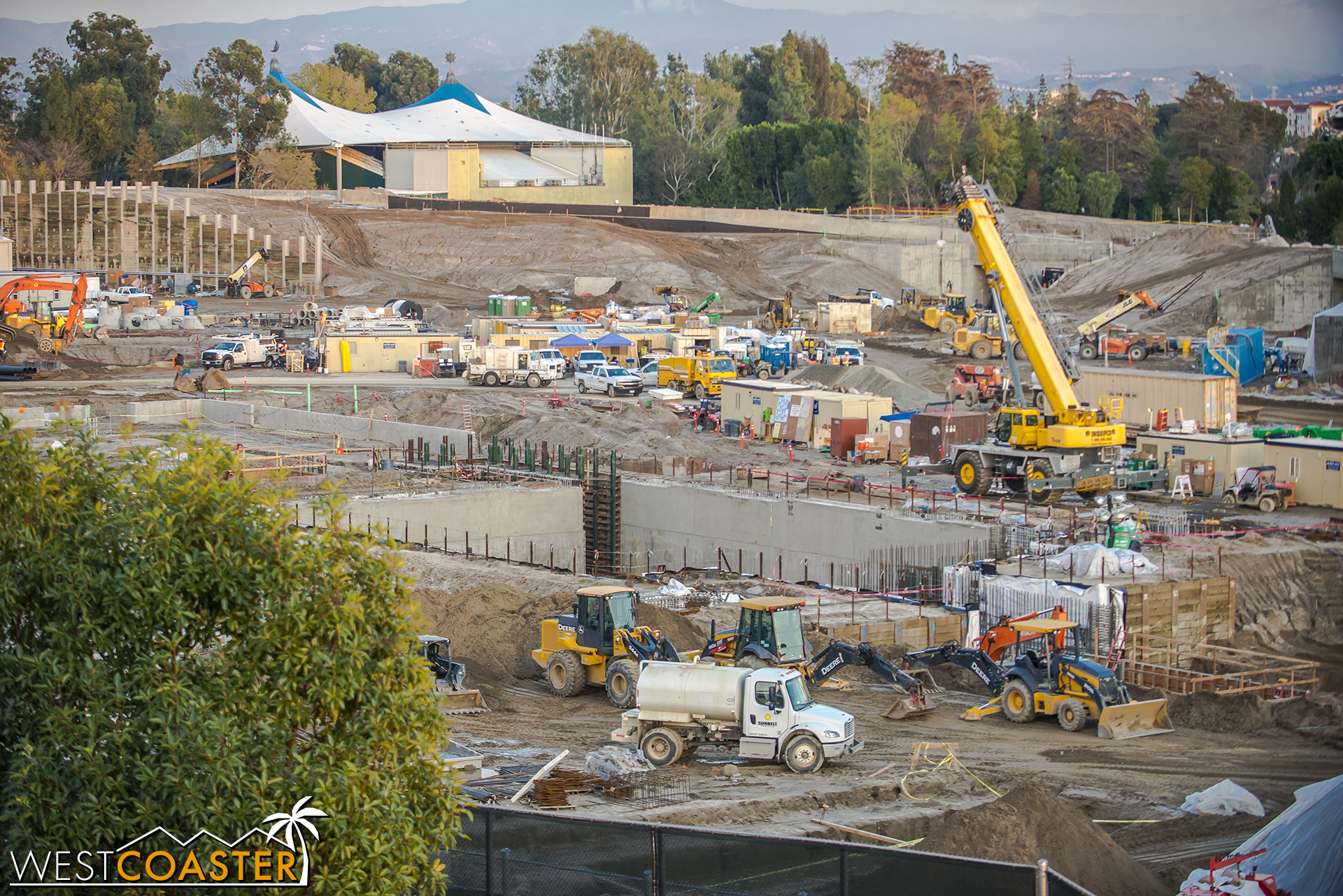  Here, we can see that giant pit that they've been digging with concrete retaining walls. 