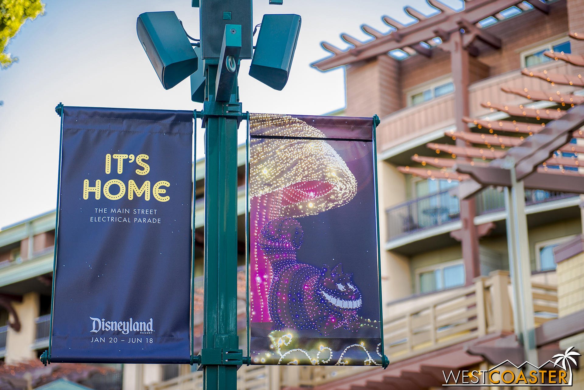 Banners advertising the return of the Main Street Electrical Parade are all around Downtown Disney.