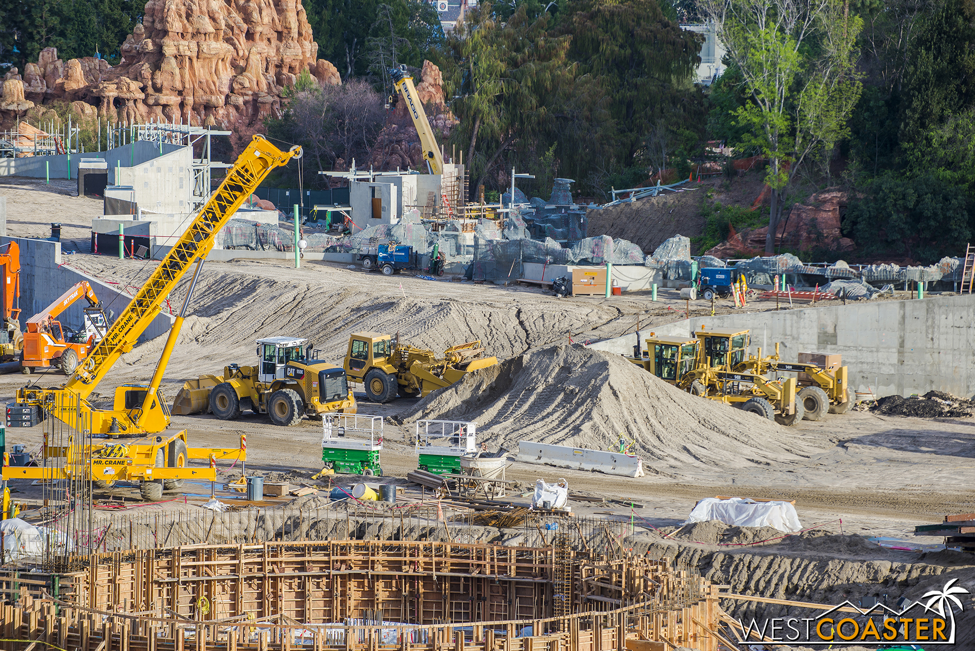  The Disneyland Railroad will pass along the river on the other side of those walls, chugging by waterfalls and a pretty elevated trestle. 