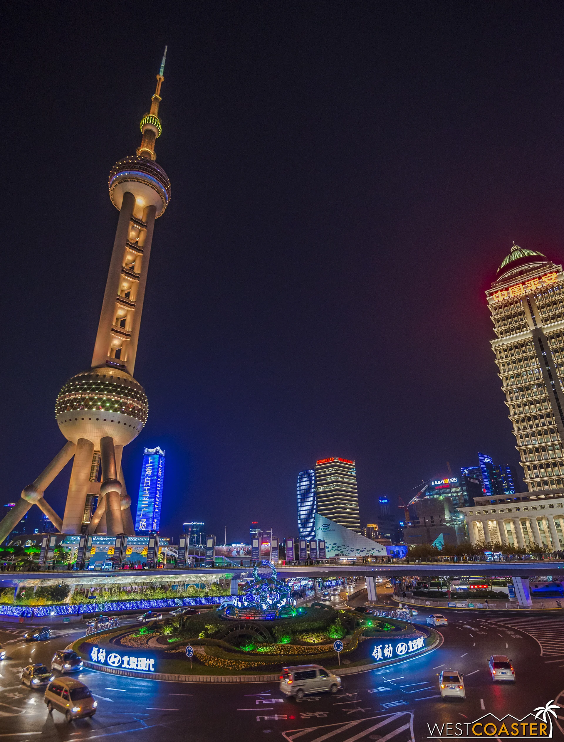 The Oriental Pearl Television Tower is iconic and unique and anchors the Lujiazui part of Pudong, on the east bank of the Huangpu River that runs through the city.