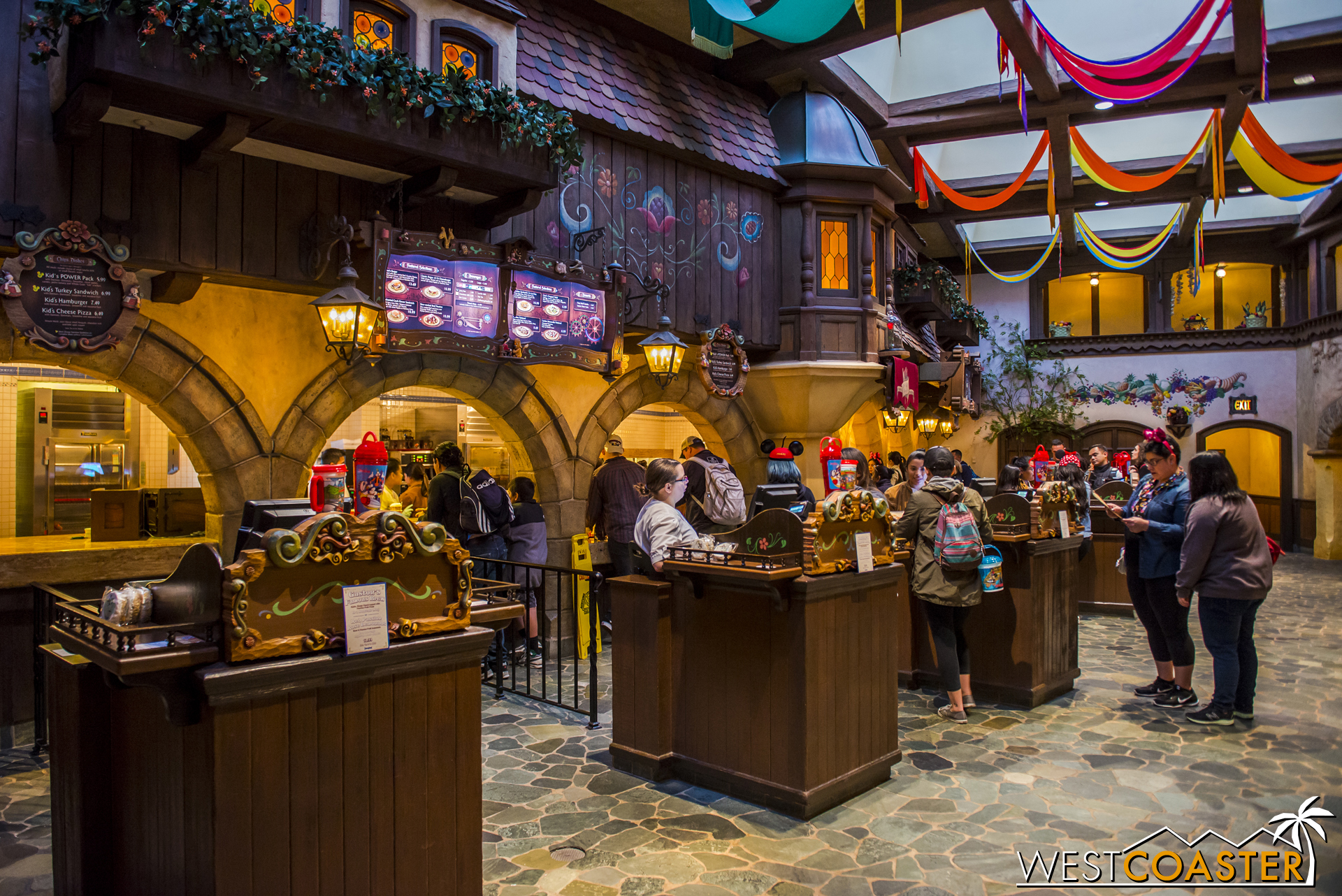 The food counter area is the same, with little details spruced in to distinguish the old  Pinocchio  ambiance from the new  Beauty and the Beast  environment. 